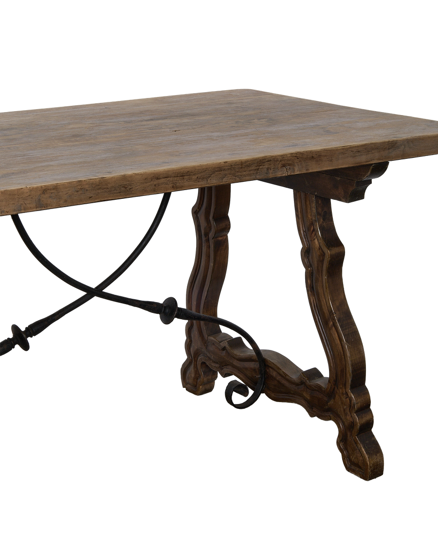 Vintage French oak refectory table, showing ornate carved legs and stretcher detail.
