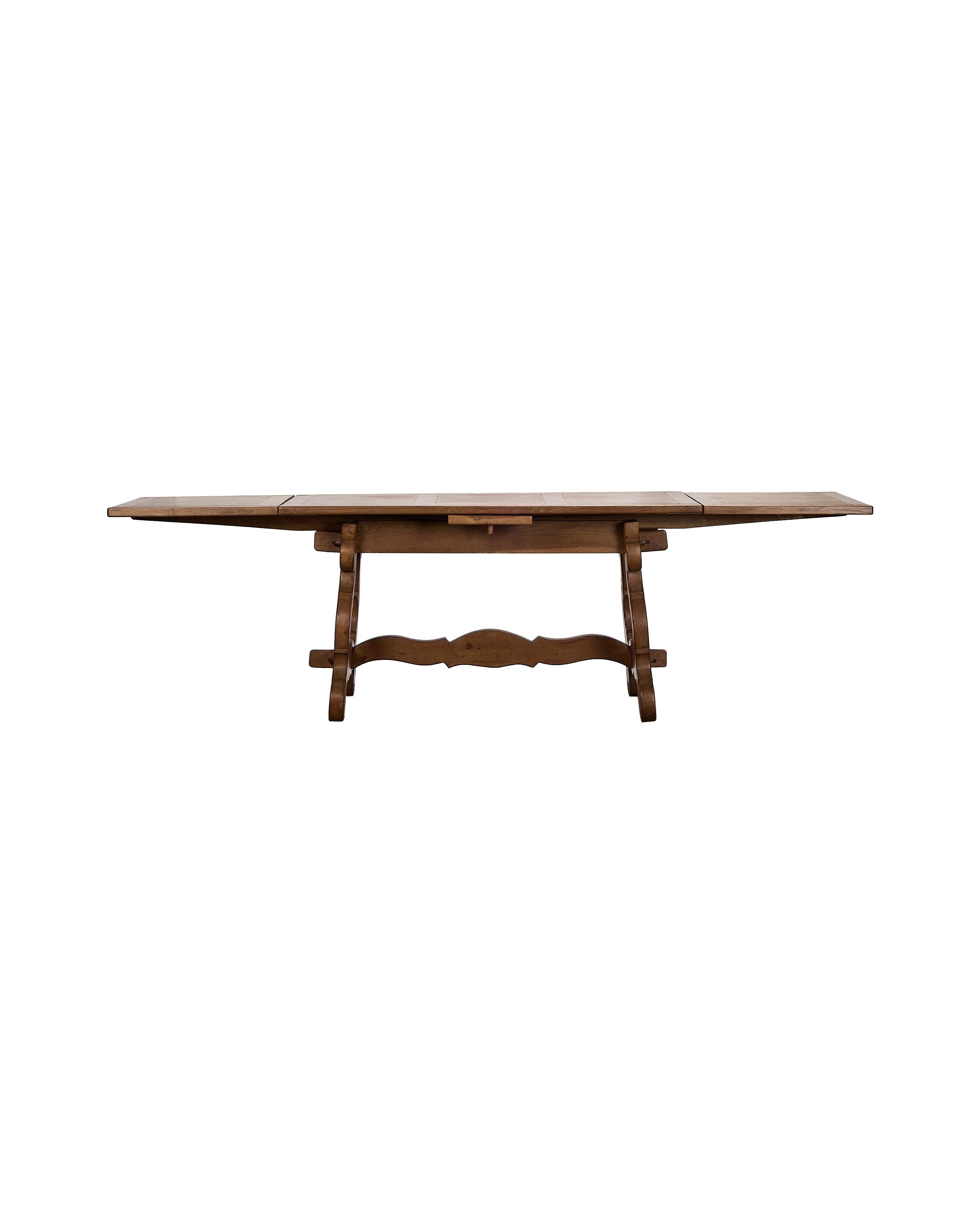 Vintage French oak refectory dining table, extended top, with carved trestle base.