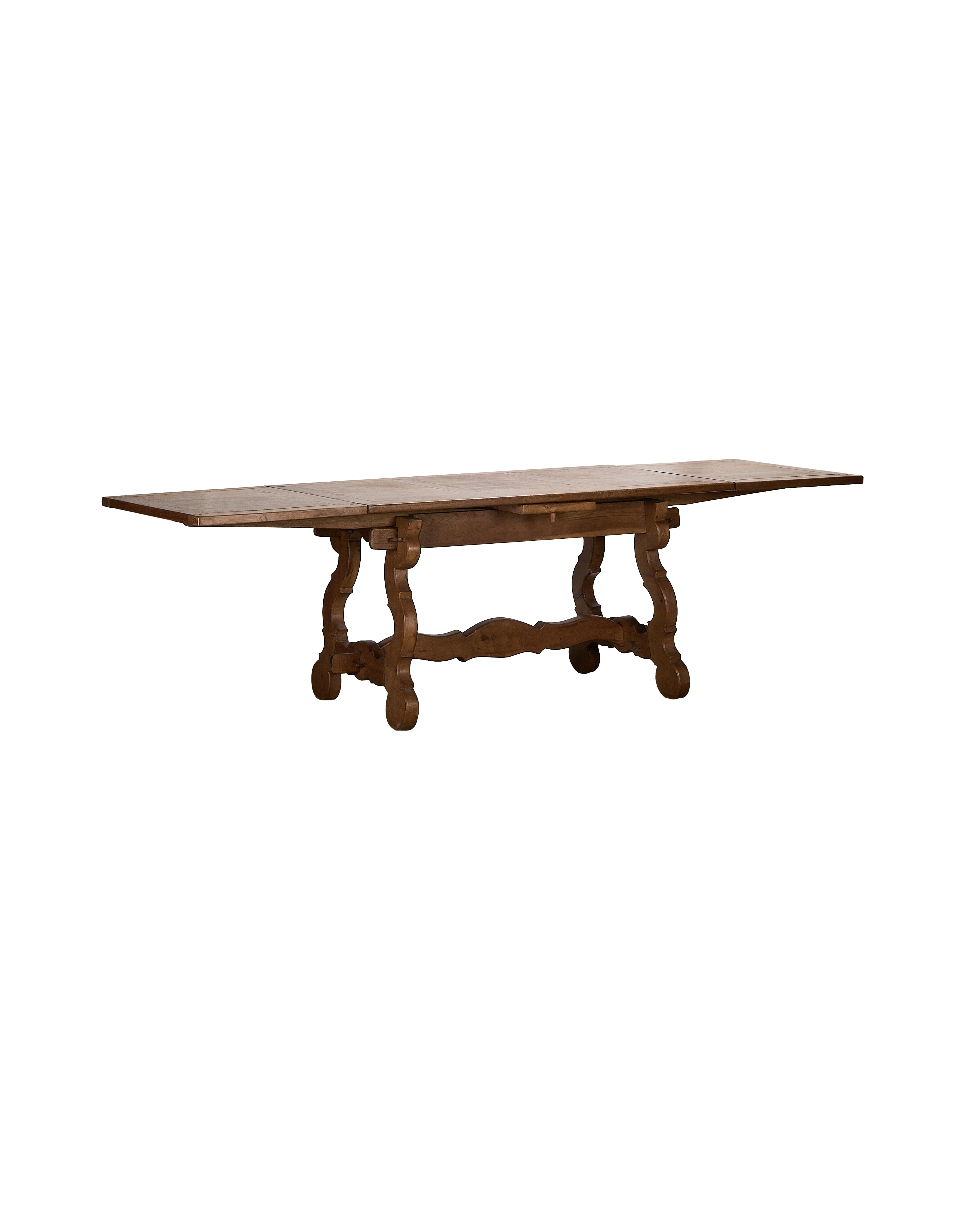 Vintage extendable French oak refectory dining table with leaf extension visible.