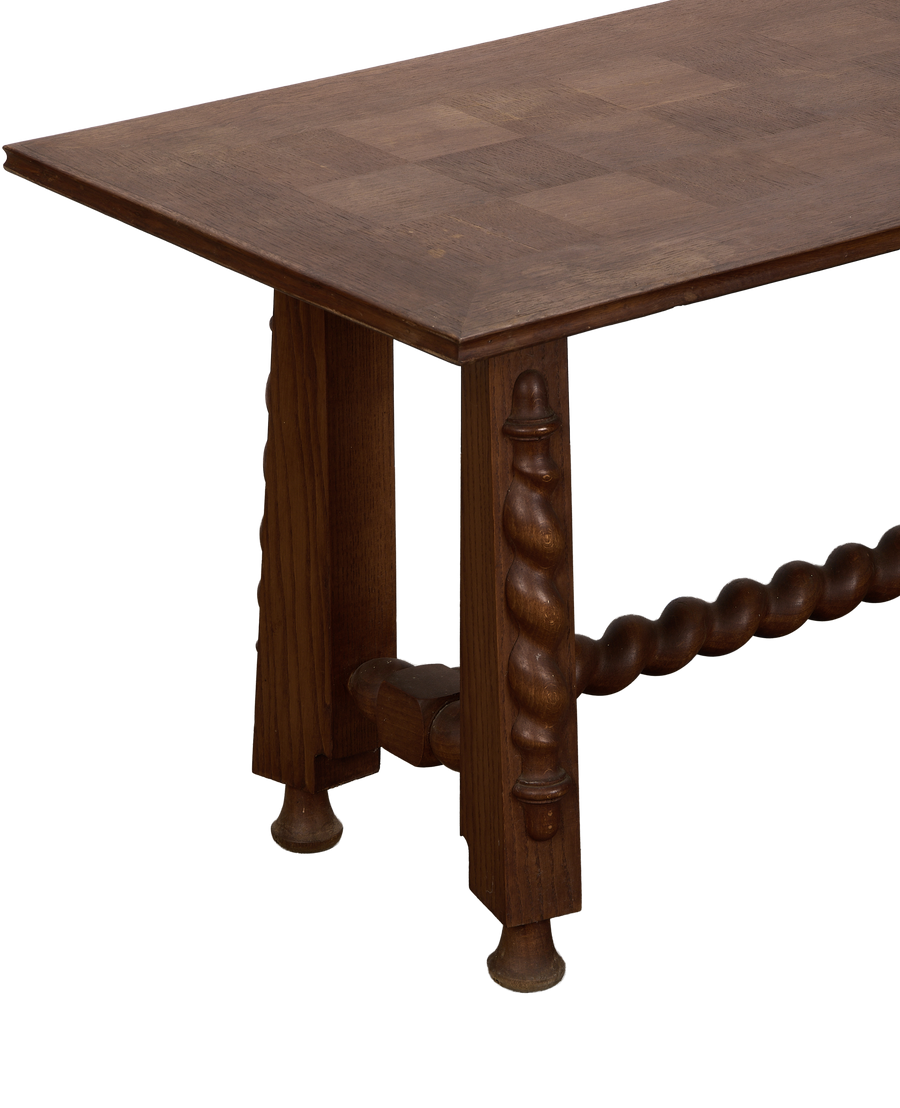 Vintage French oak coffee table, close-up showing checkered top and barley twist leg detail.