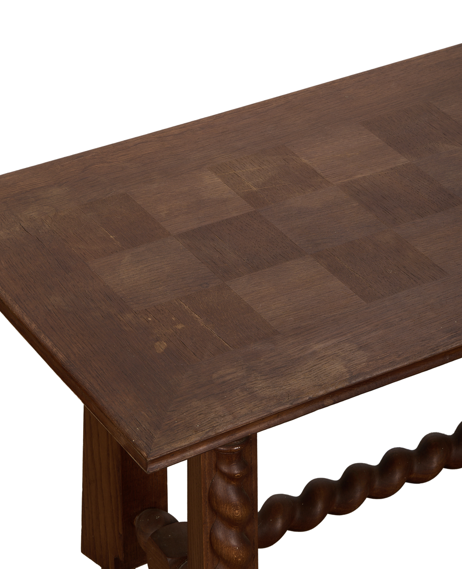 Vintage French oak coffee table with checkered top and barley twist leg detail.