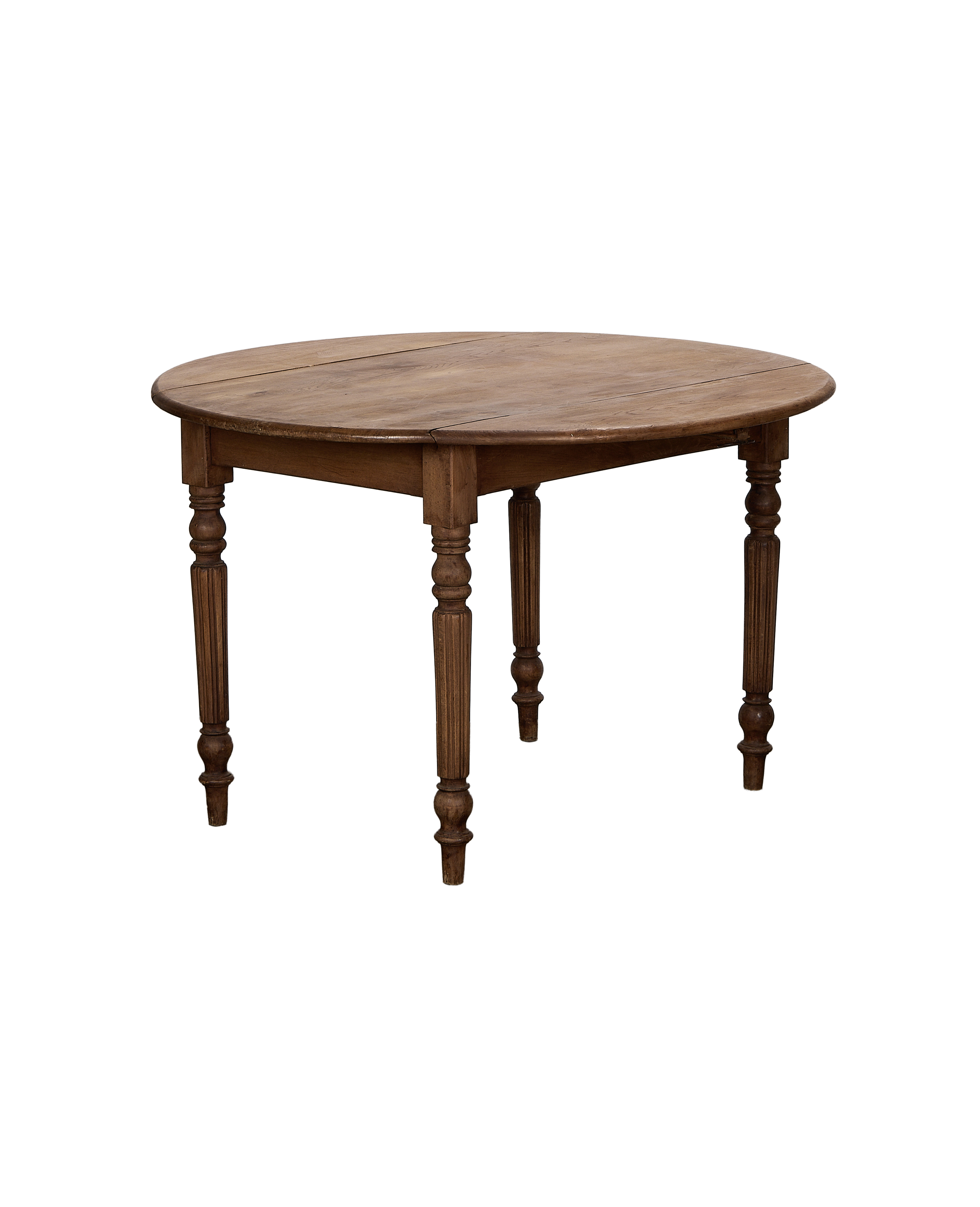 Vintage French oak drop leaf table, partially open, showing elegant turned legs.