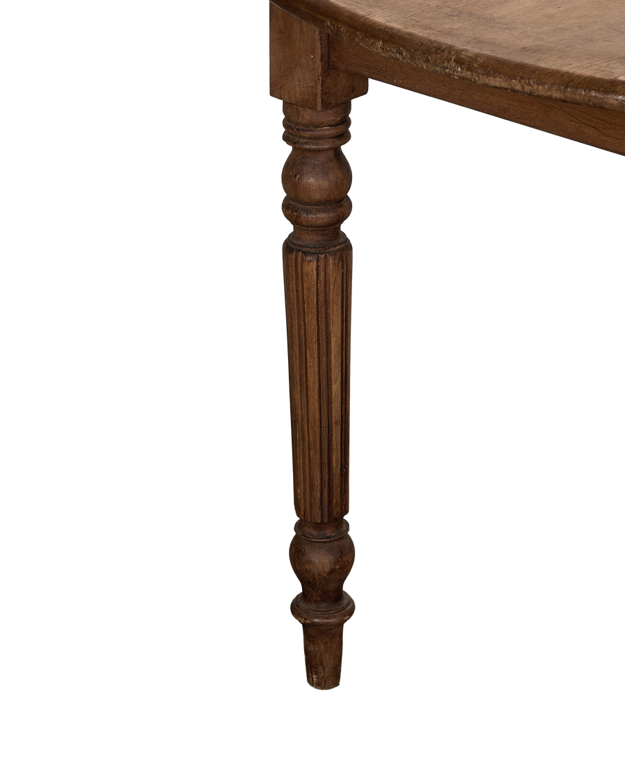 Vintage French oak drop leaf table, detailed view of single ornate fluted leg.