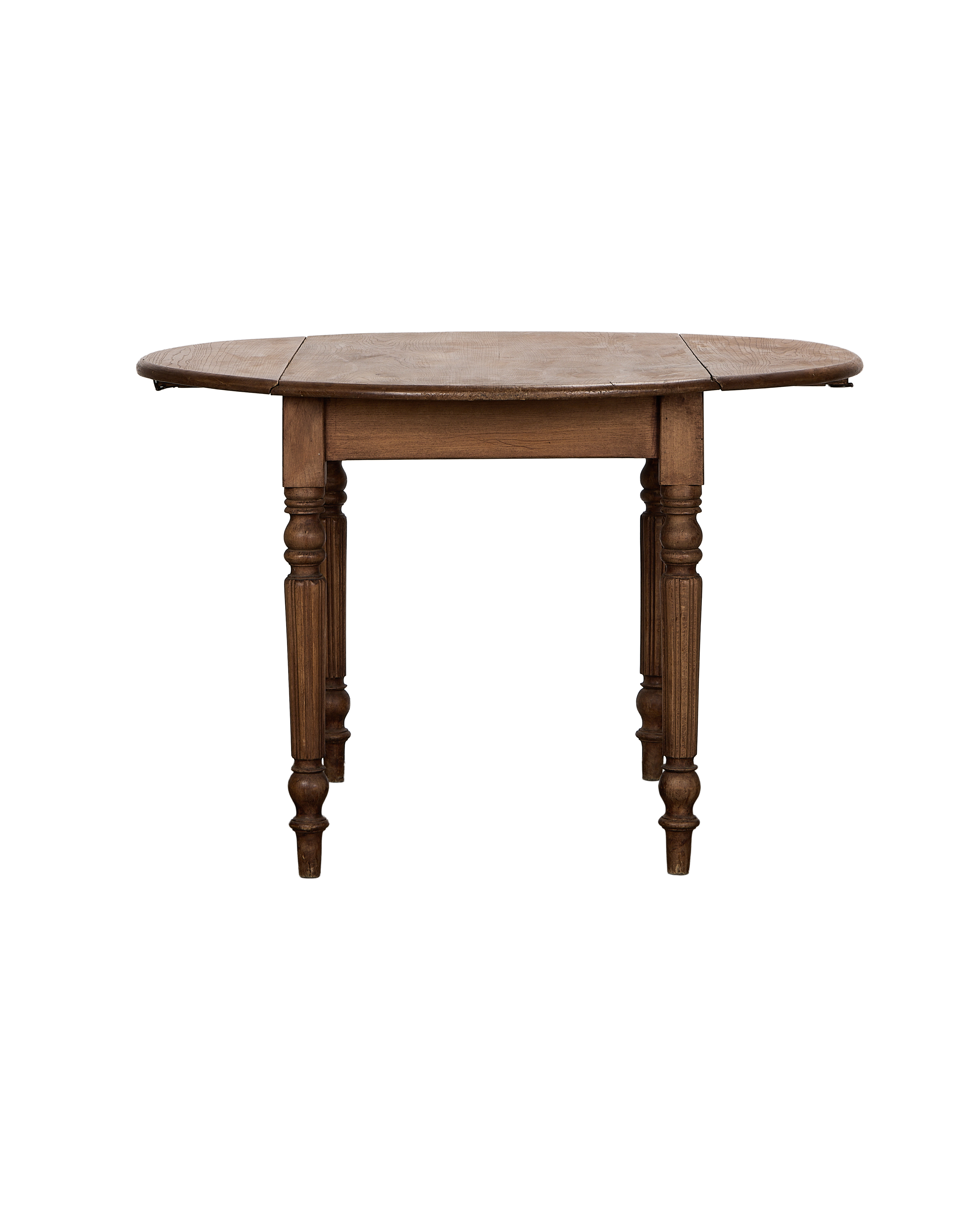 Vintage French oak drop leaf table, leaves up, showcasing aged wood grain.