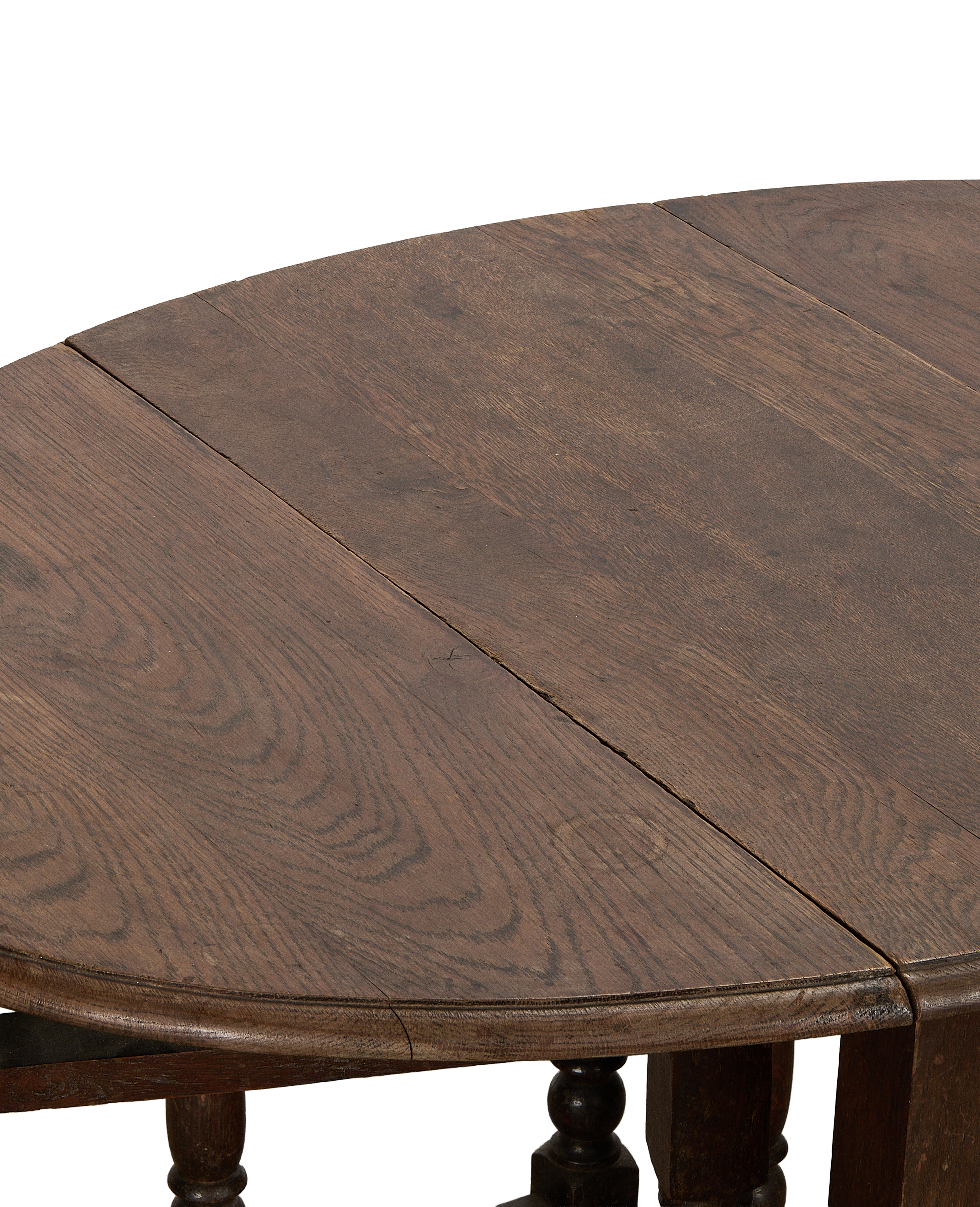 Vintage French oak drop gate leg table, close-up showing tabletop's aged wood grain.