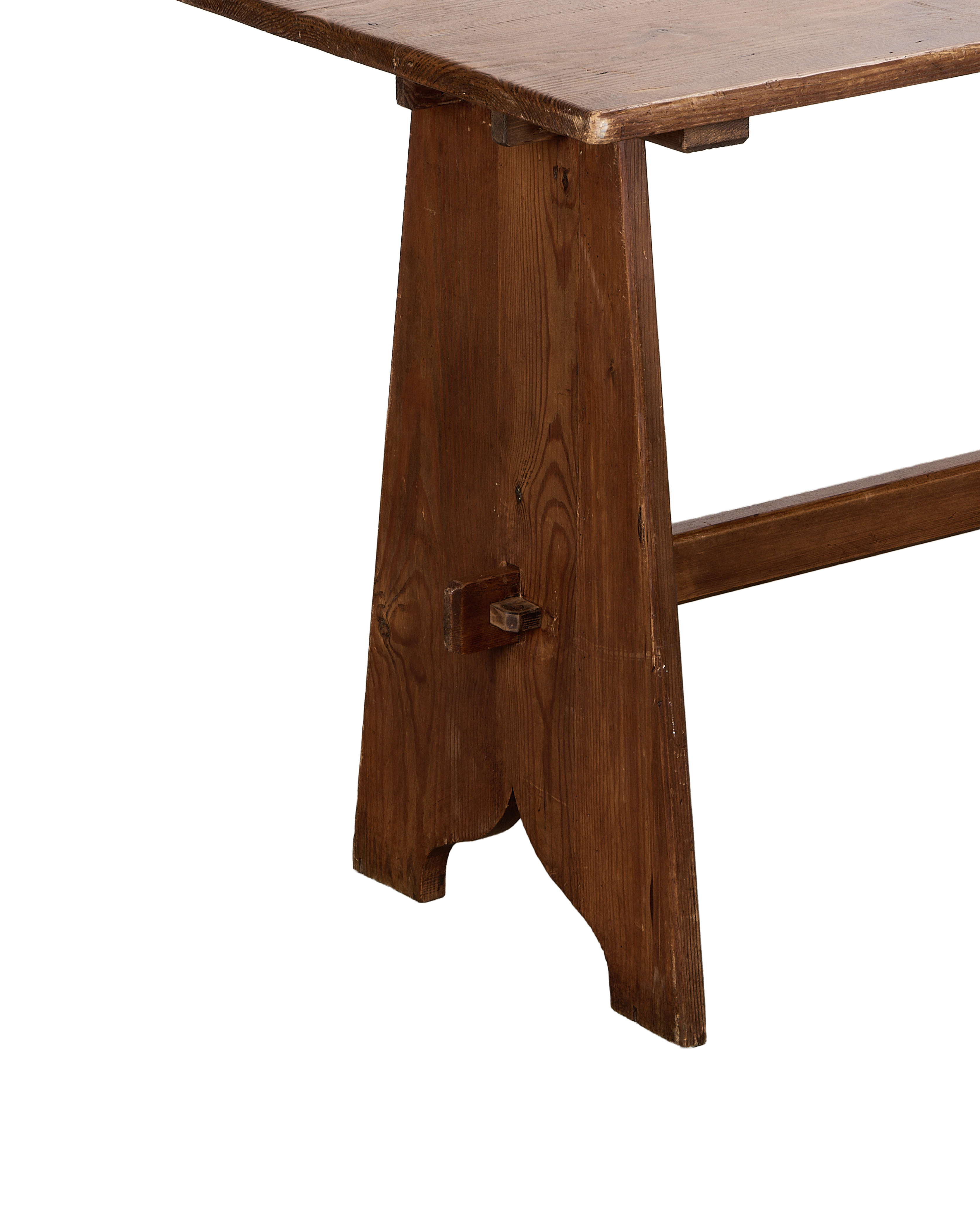 Vintage French oak refectory table's sturdy trestle leg with peg joint detail.