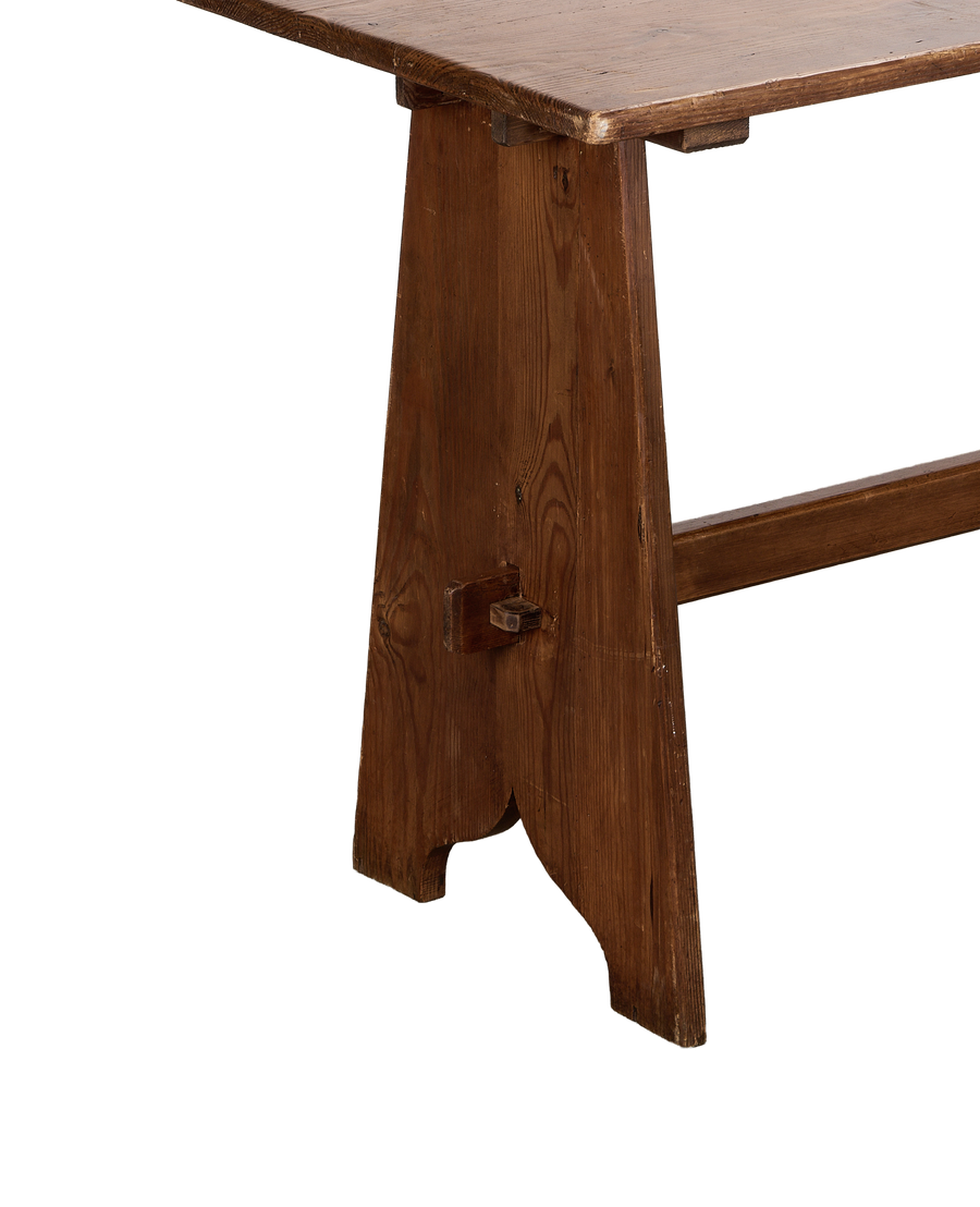 Vintage French oak refectory table's sturdy trestle leg with peg joint detail.