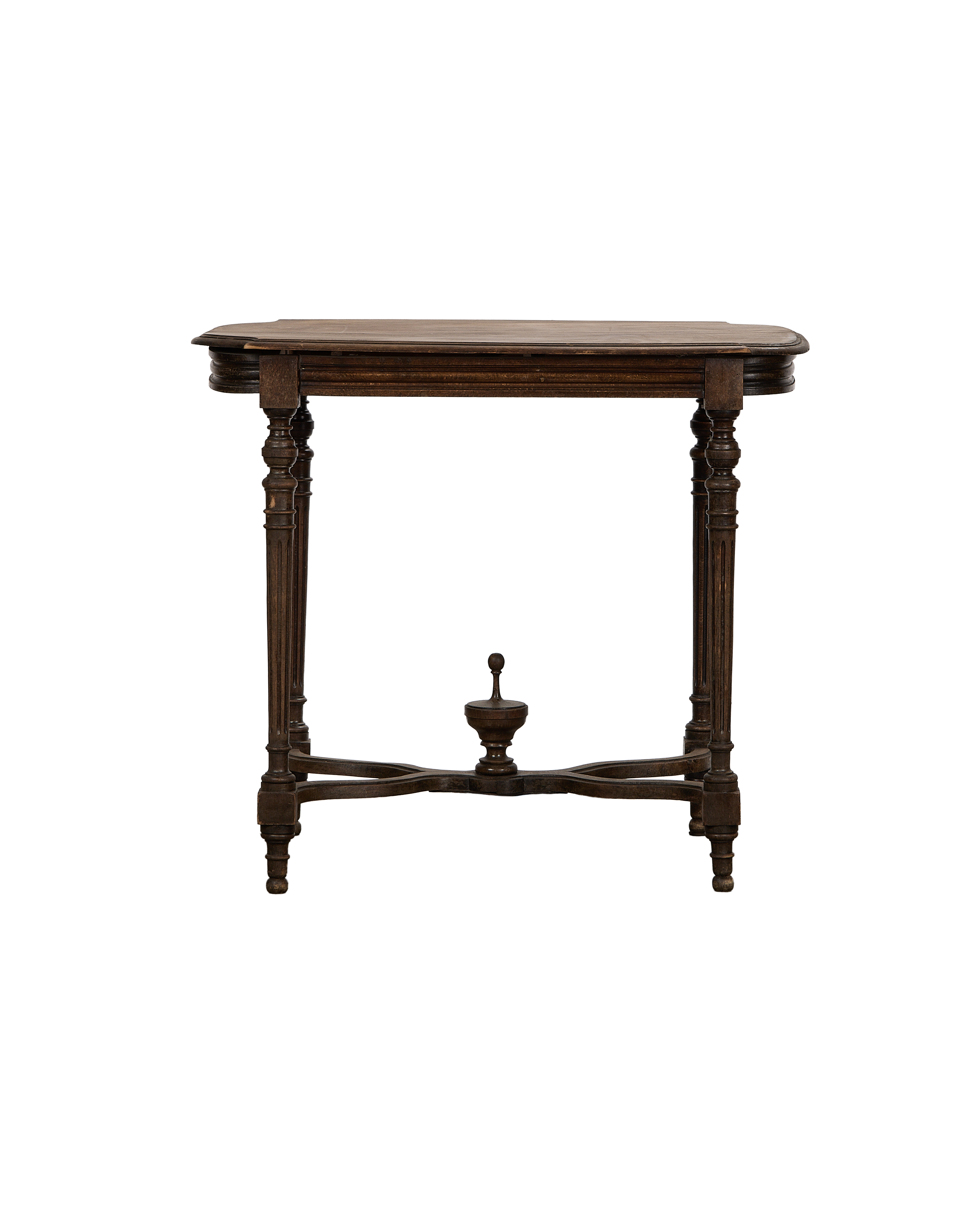 Vintage French Napoleon-style oak table, showing cross-bottom stretcher and turned legs from front.