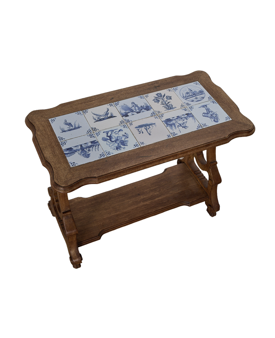 Vintage French oak table with curved base and Delft tile top.