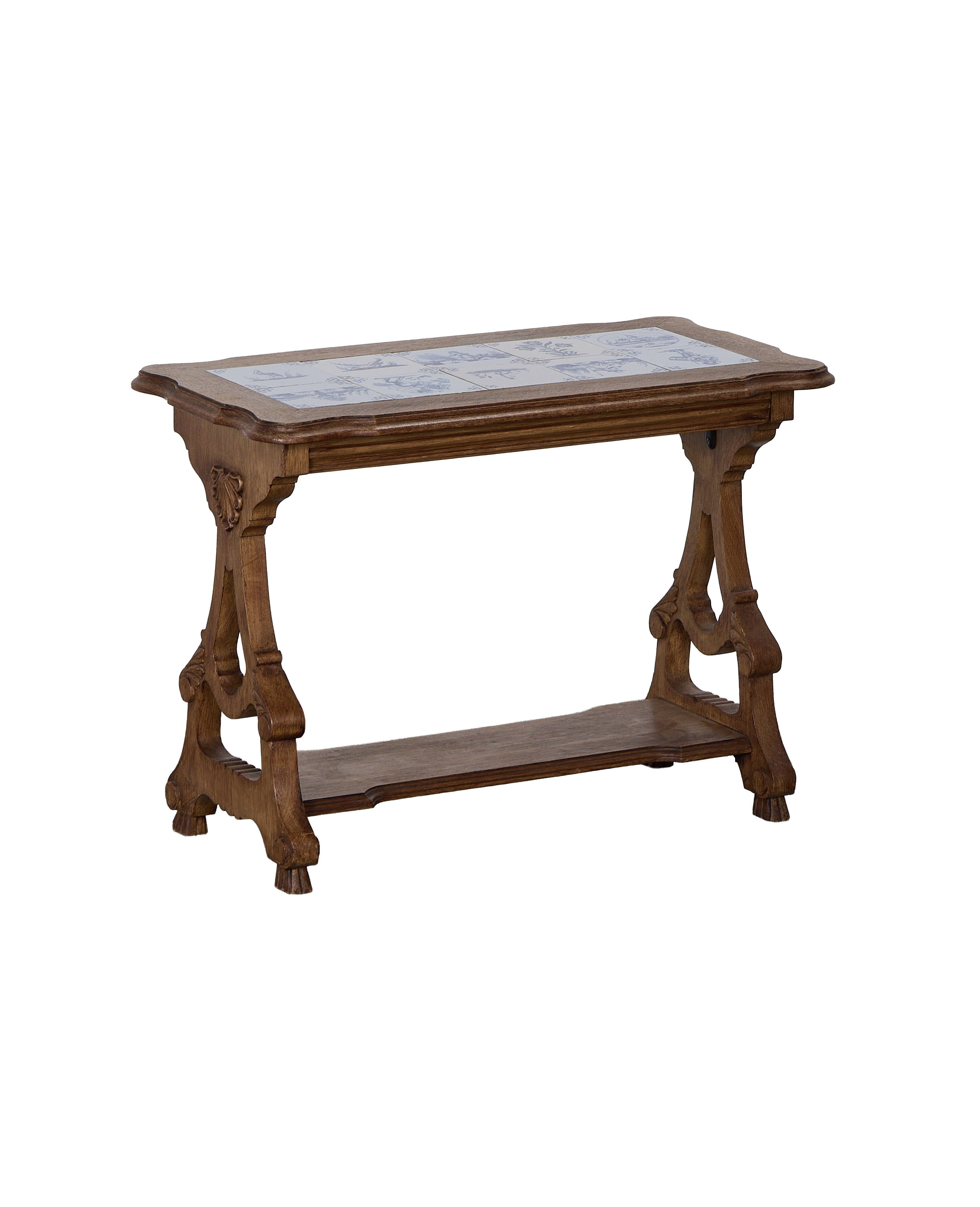 Vintage French oak Delft tile table, full view showing detailed carving, condition, and lower shelf.