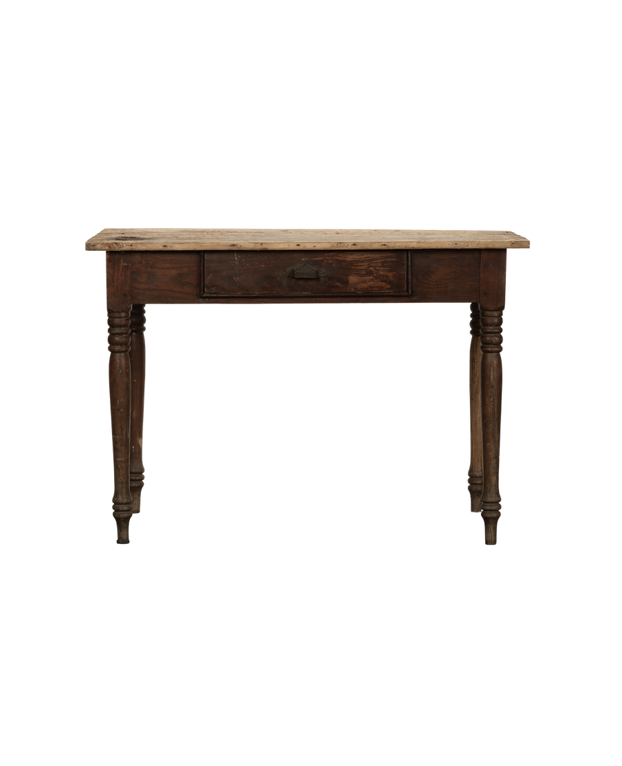 French vintage oak farm table, showing distressed wooden top and turned legs from a front view.