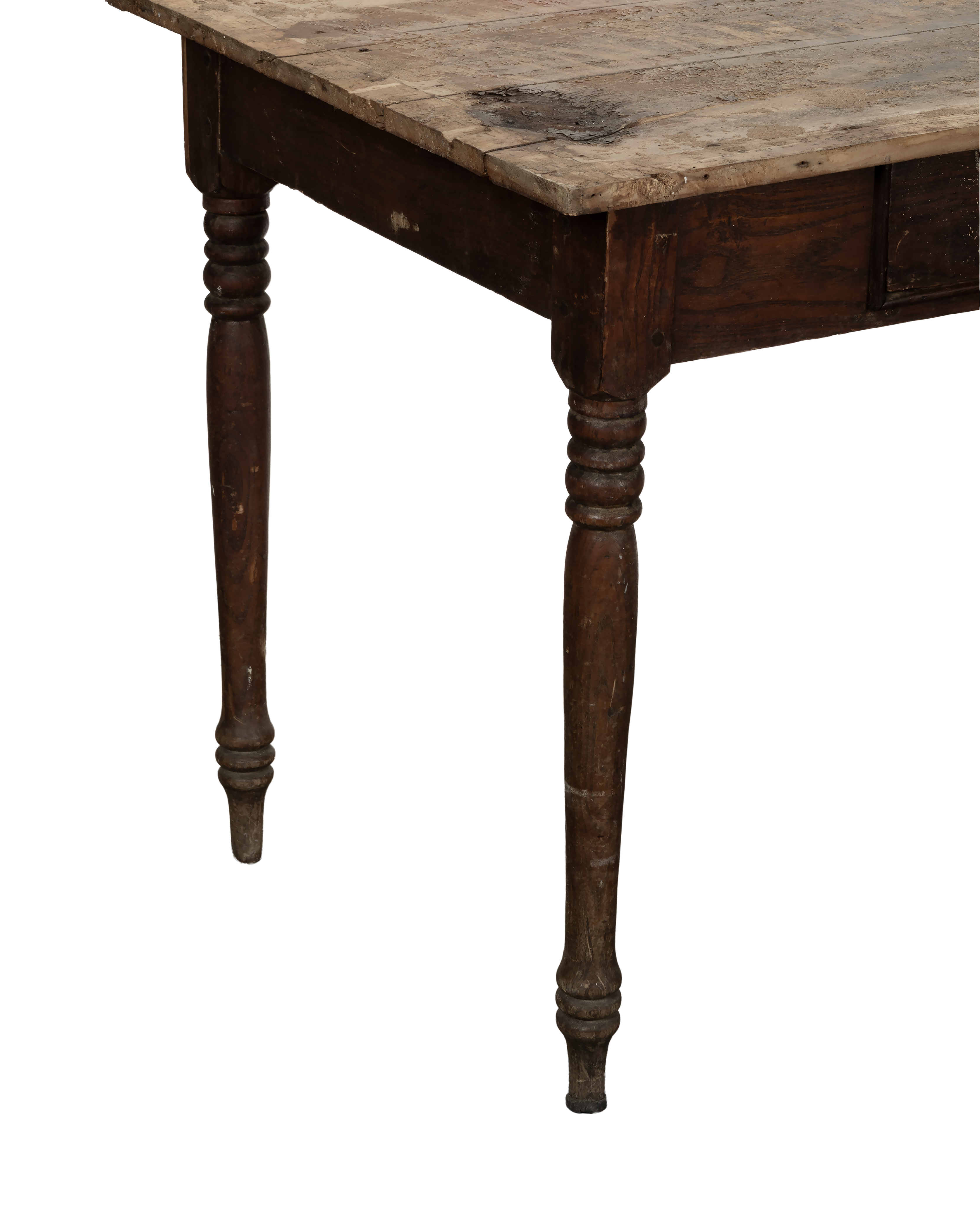 Vintage oak farm table from France, showing ornate turned legs and distressed tabletop from an angle.
