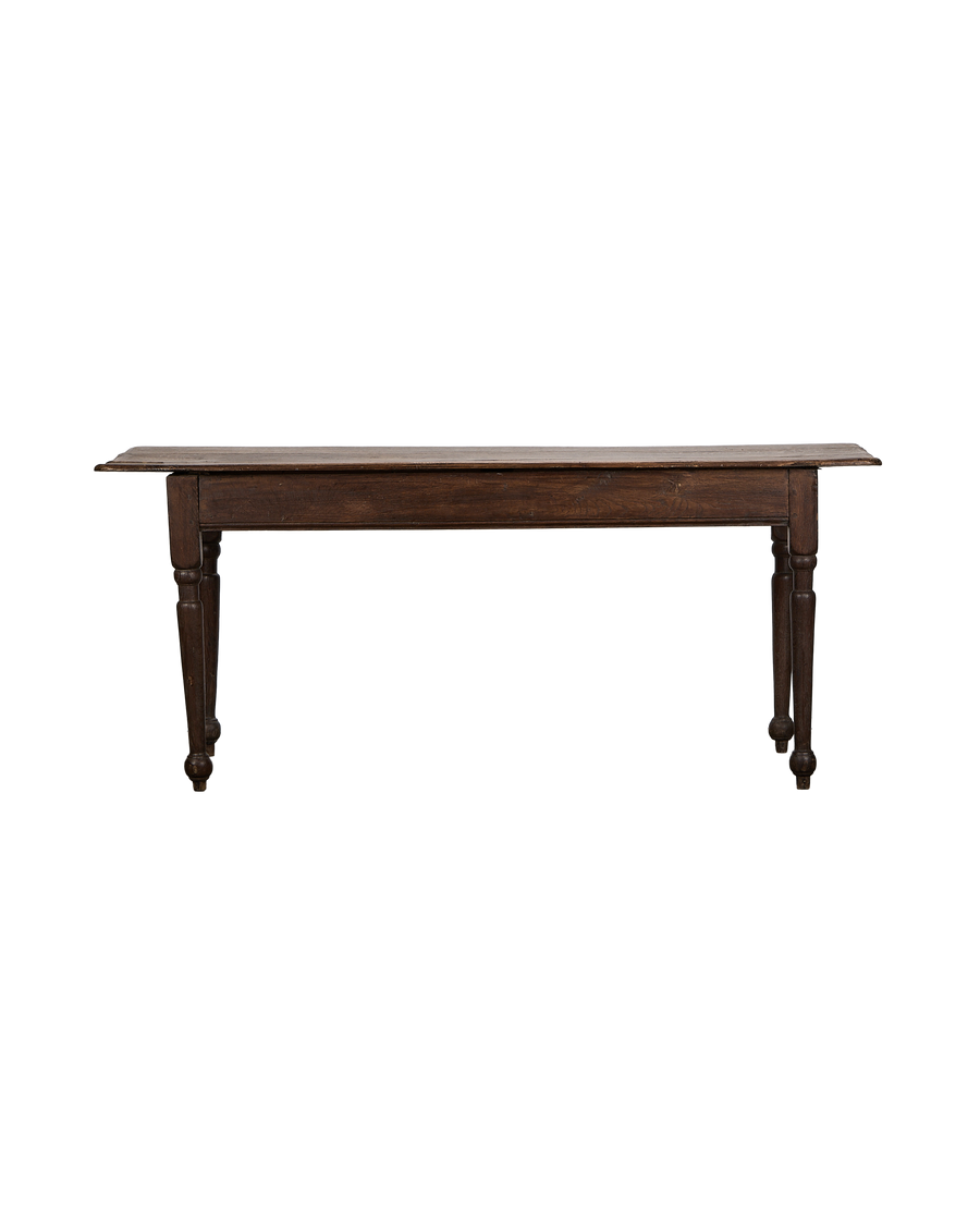 Vintage French oak farm table, showing the full length and turned legs.
