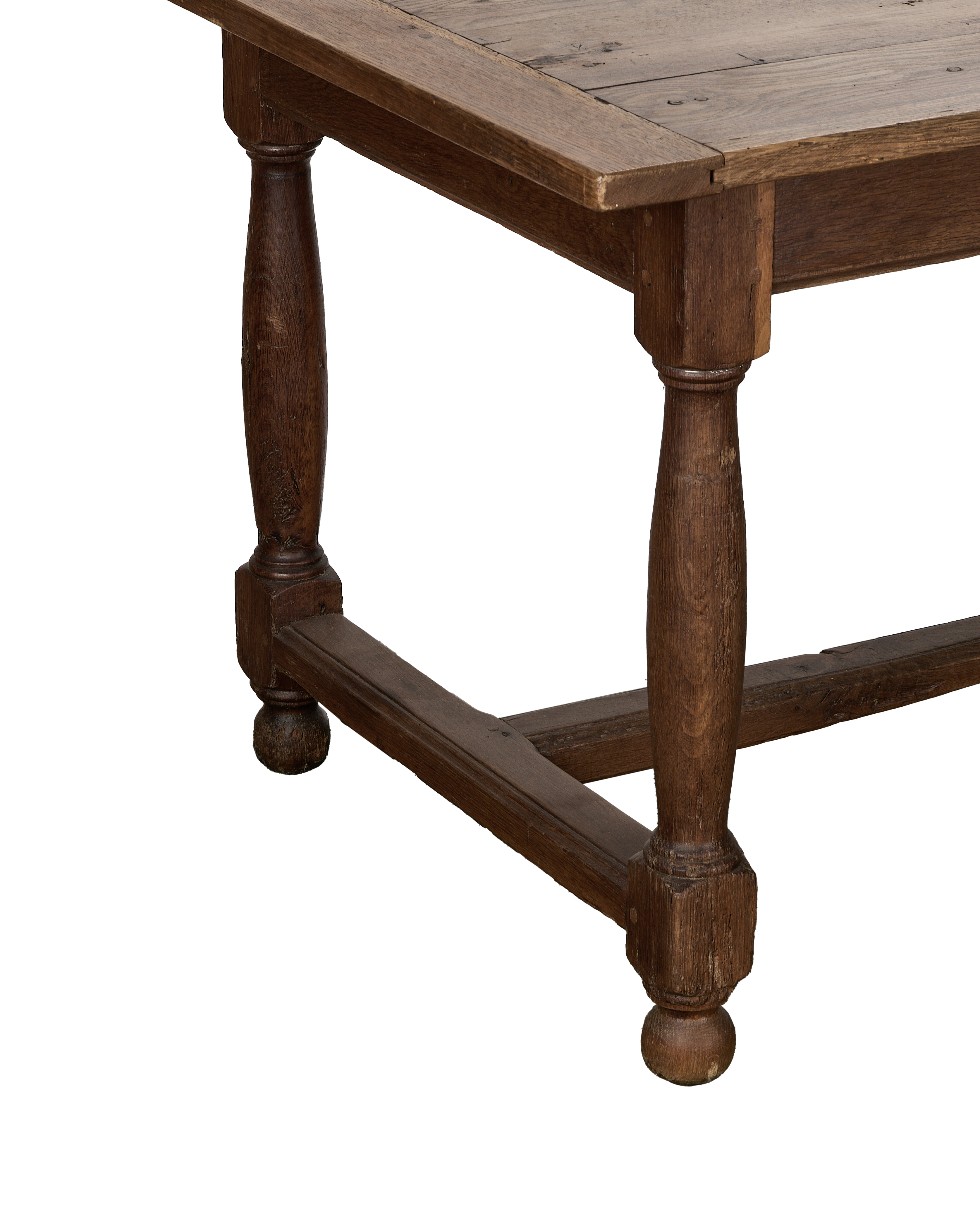 Vintage French oak farm table showing turned legs and stretcher, good condition.