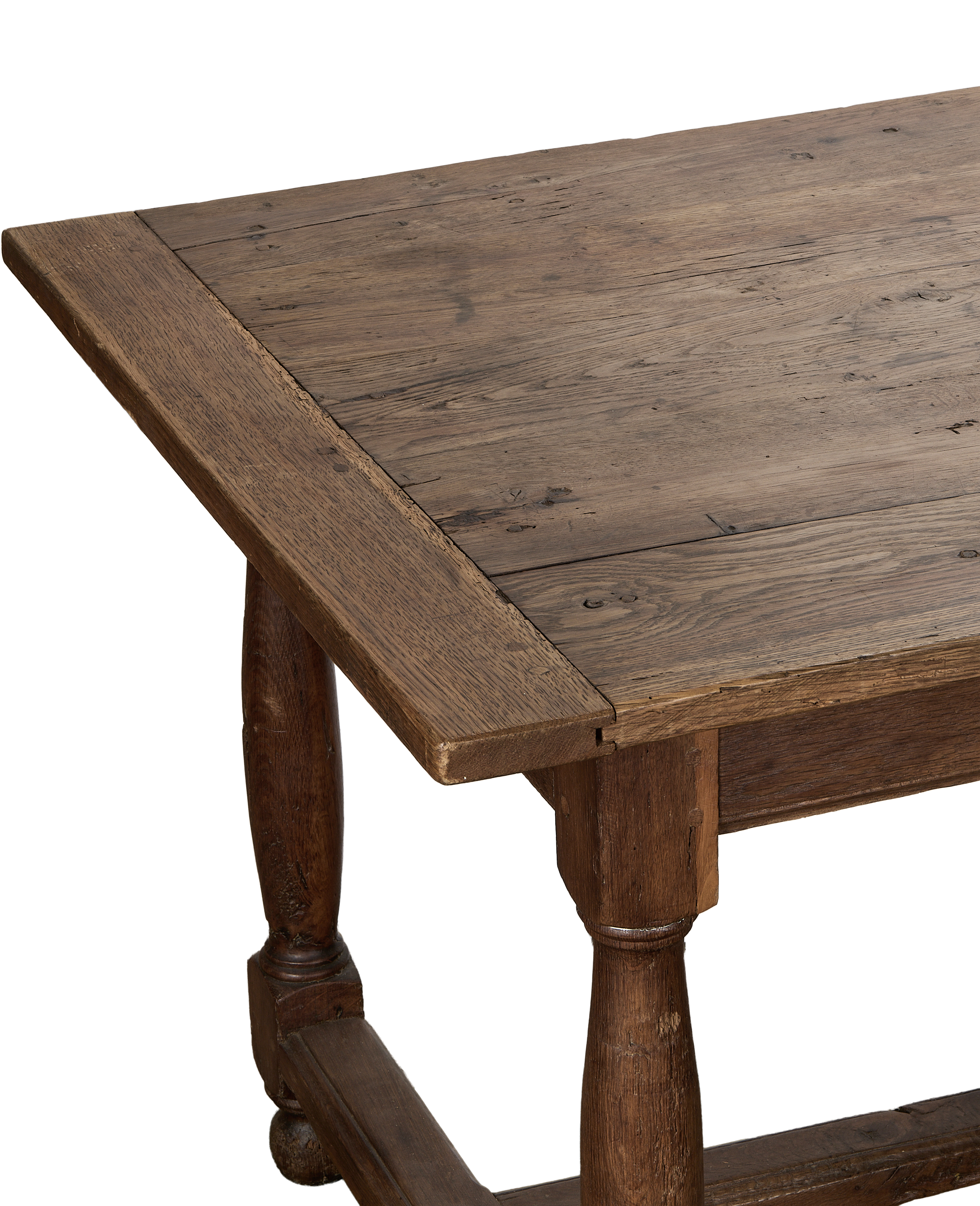 Vintage French oak farm table, rich grain detail on aged plank top.