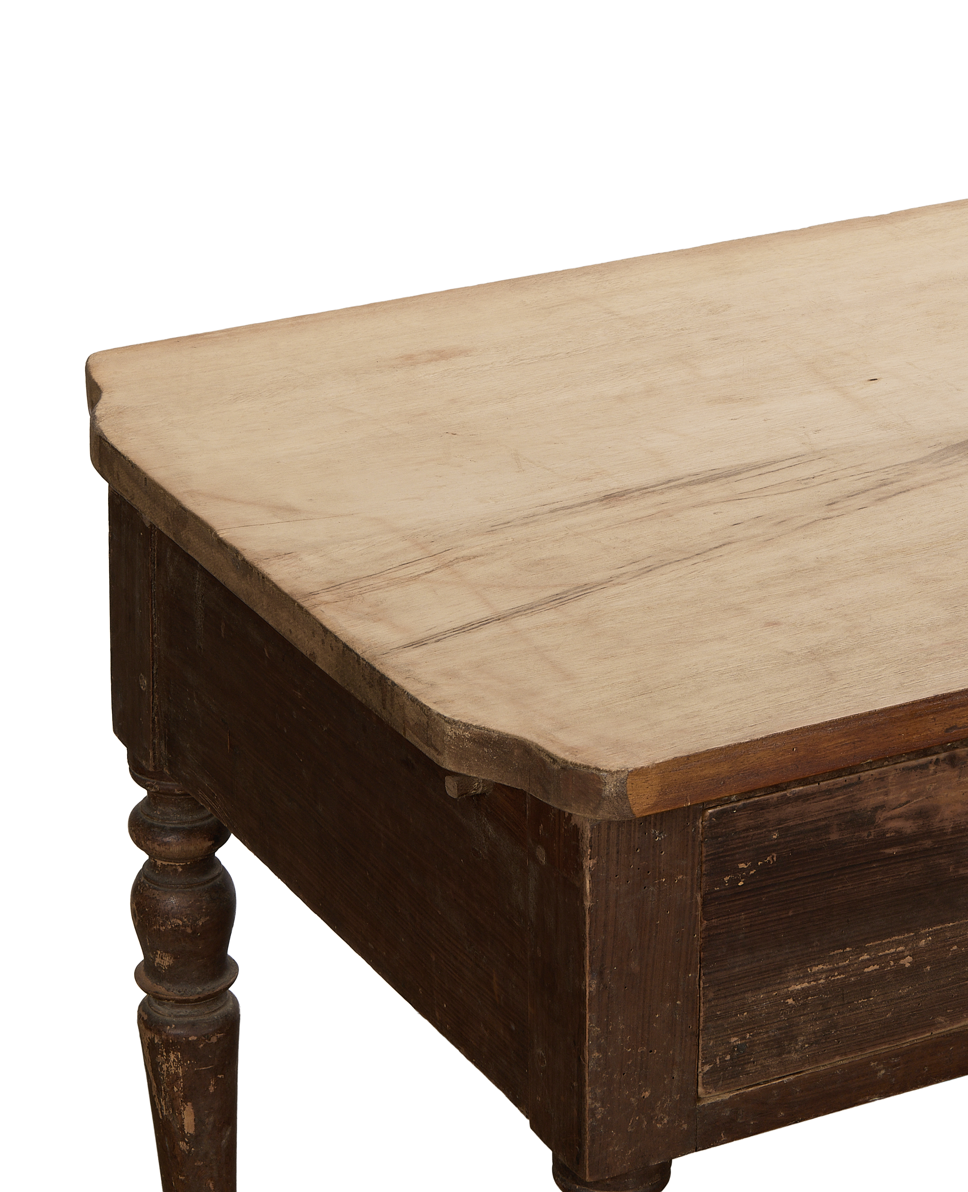 Vintage French oak kitchen island, close-up top view showing light wood surface and dark leg.