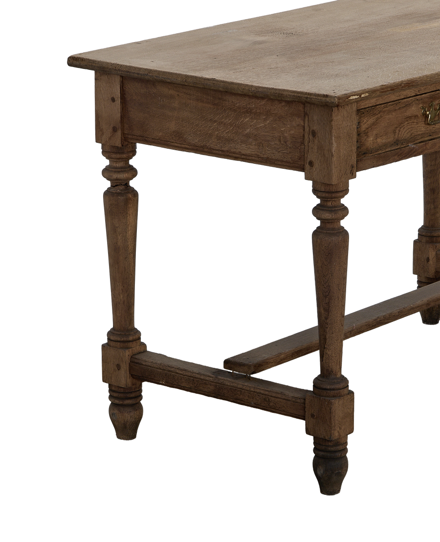Vintage French oak farm table, showing distressed wood, curved legs, and stretcher details.