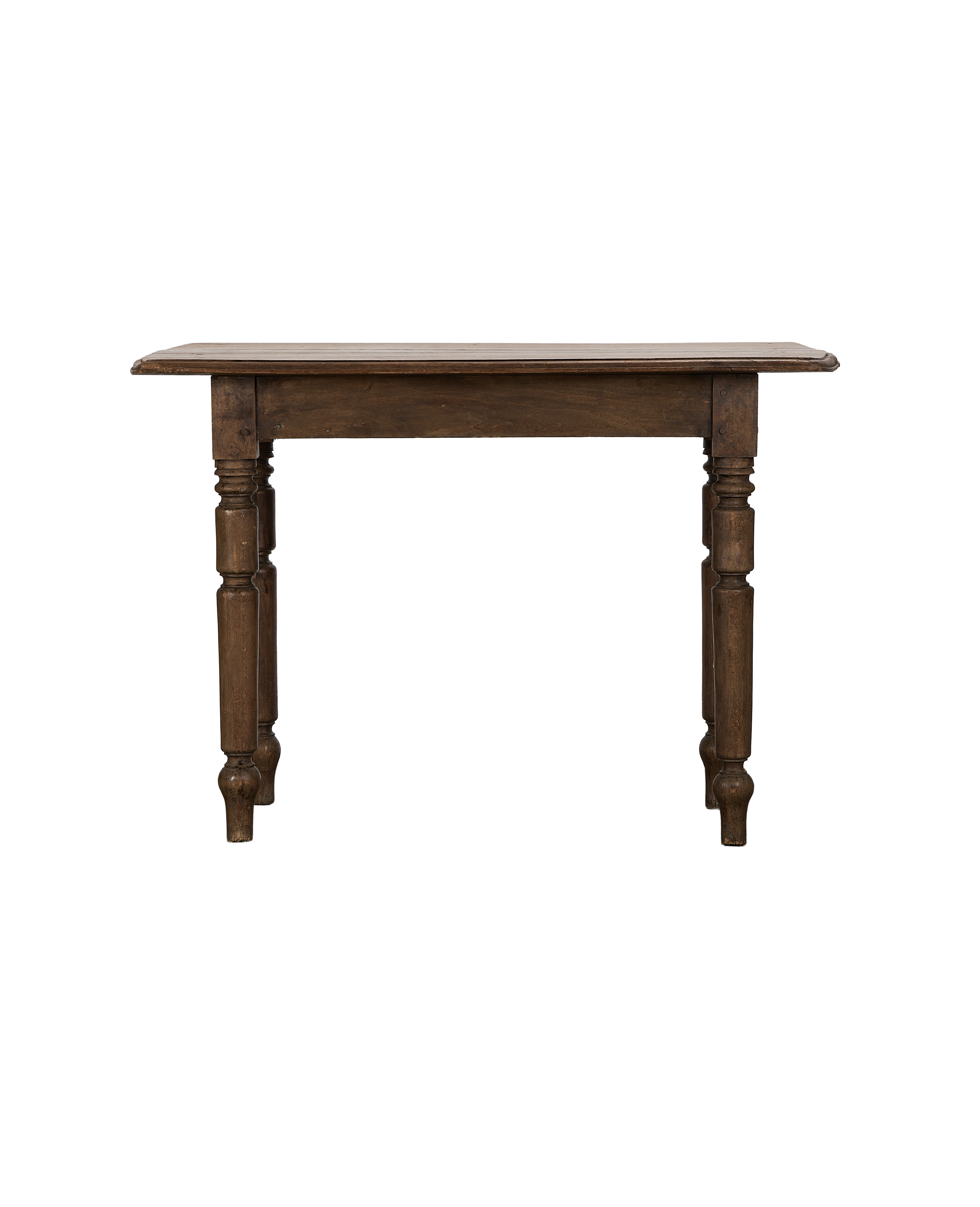 Vintage French oak farm table, showing ornate turned legs and rustic top from front angle.