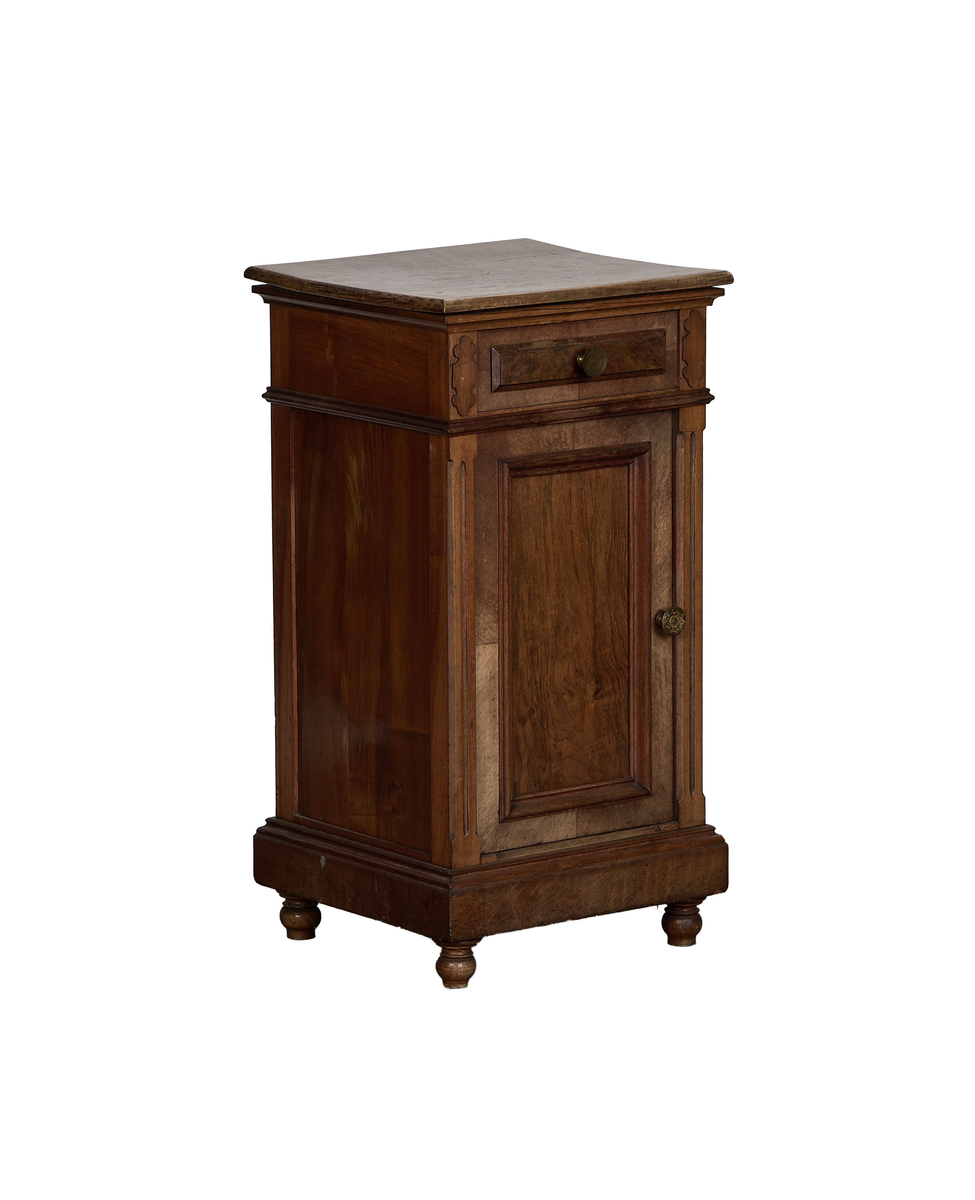 Vintage French oak nightstand, full view angled to showcase brass hardware and spindle feet.