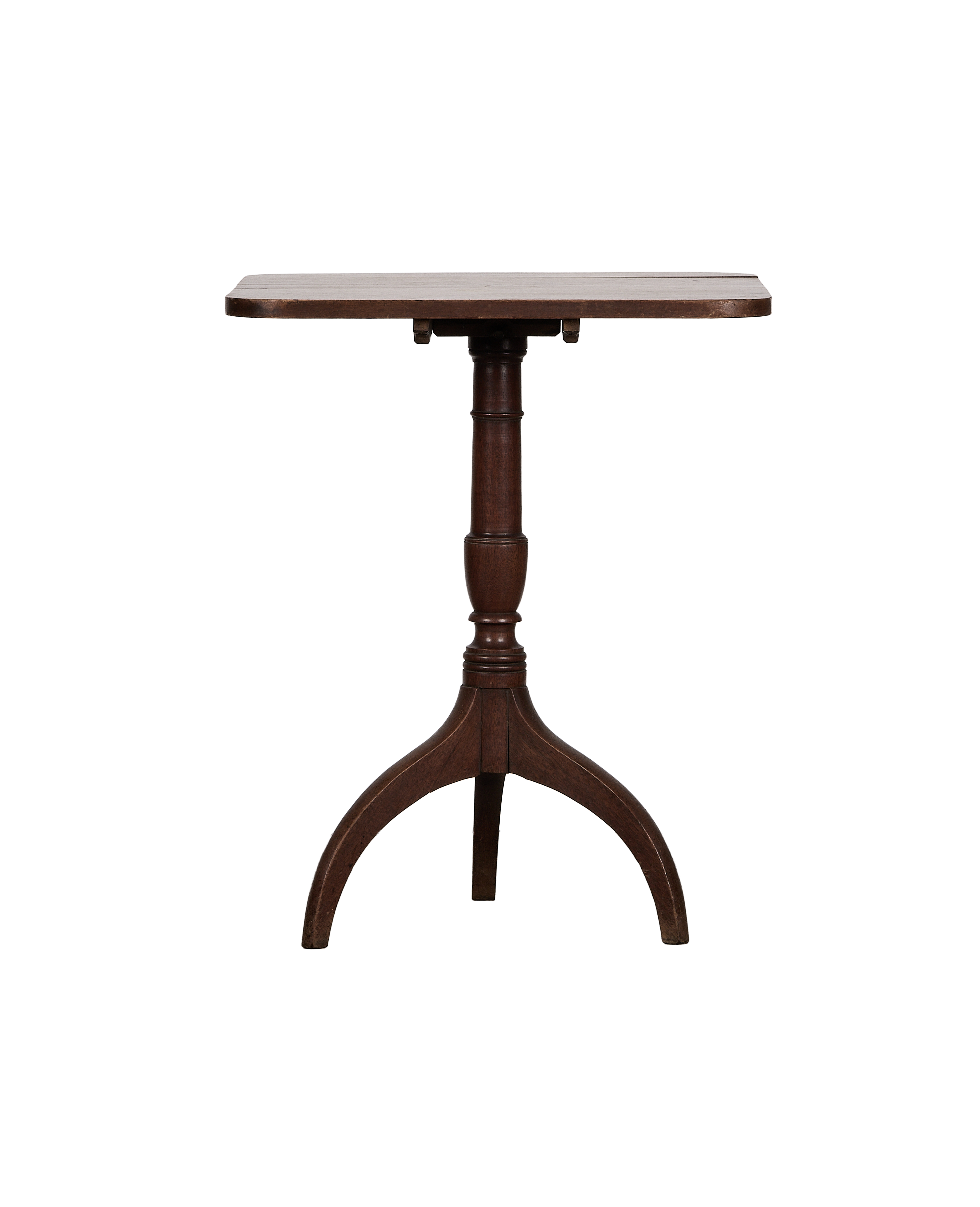 Vintage French folding oak bistro table from the side, showcasing the rounded brown top and tripod base.
