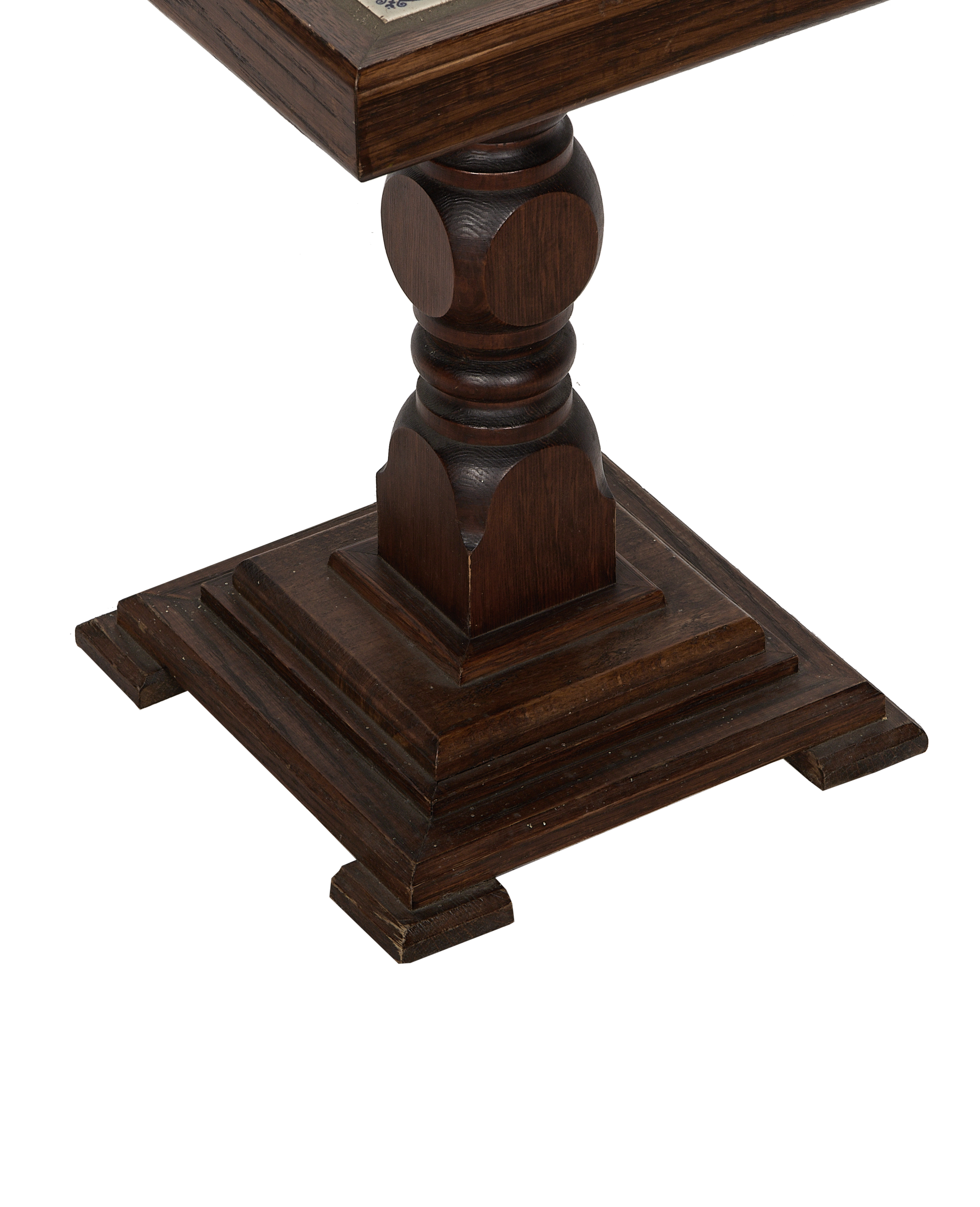 Vintage French oak Delft tile side table pedestal, showing its ornate turned column and square carved base.