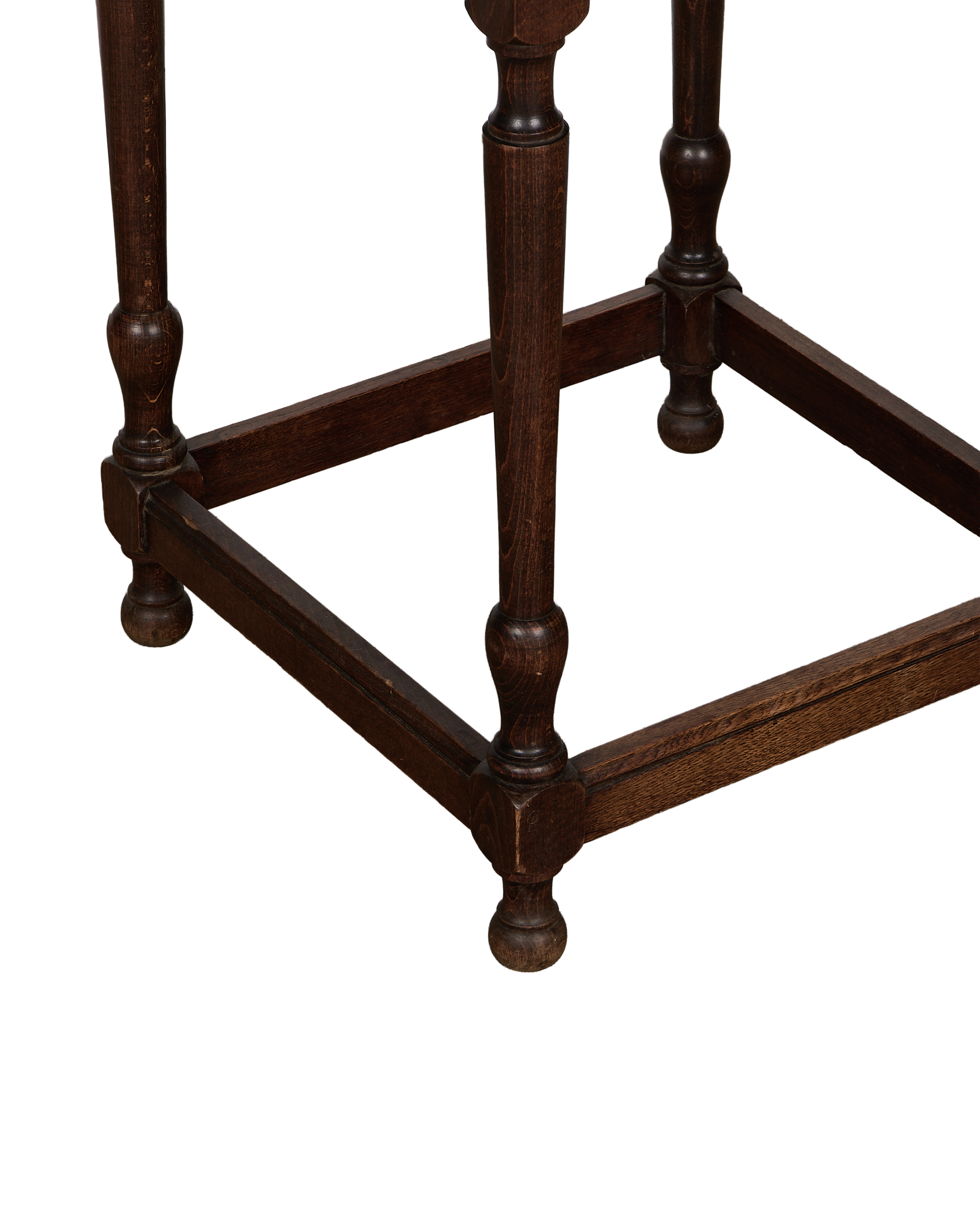 Vintage French dark oak clover drop leaf table, view of lower frame support.