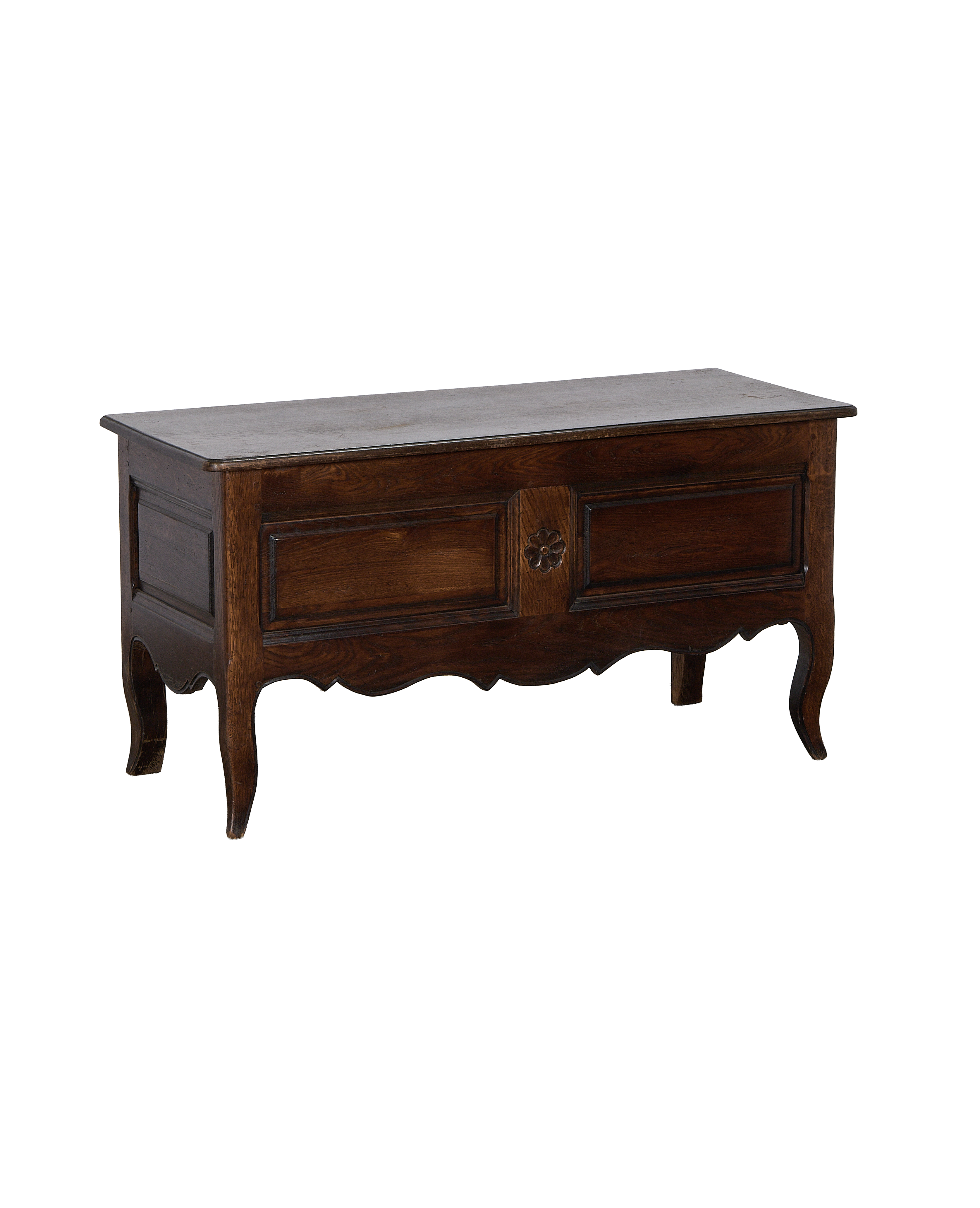 Vintage French Oak chest with carved rosette, cabriole legs, and visible distressed finish.