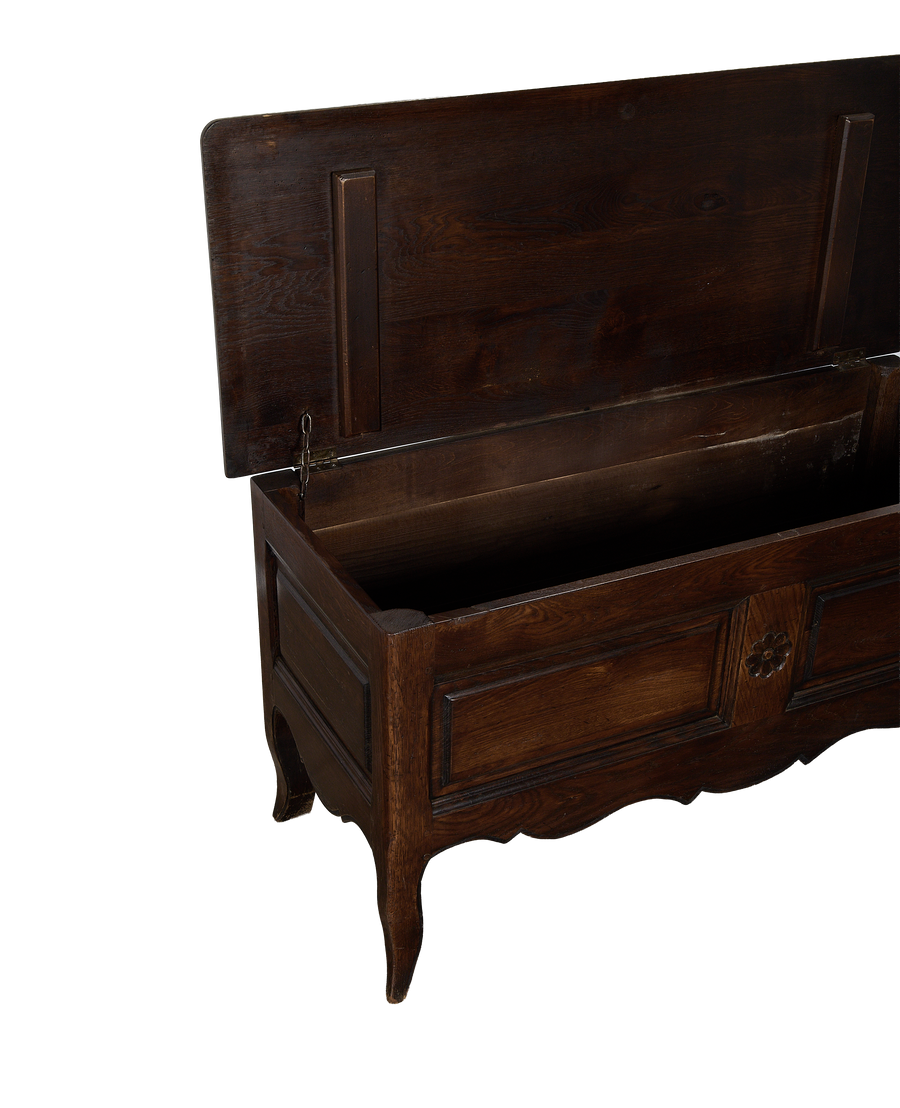 Vintage French dark oak chest with lid opened, showing spacious interior and hinges.