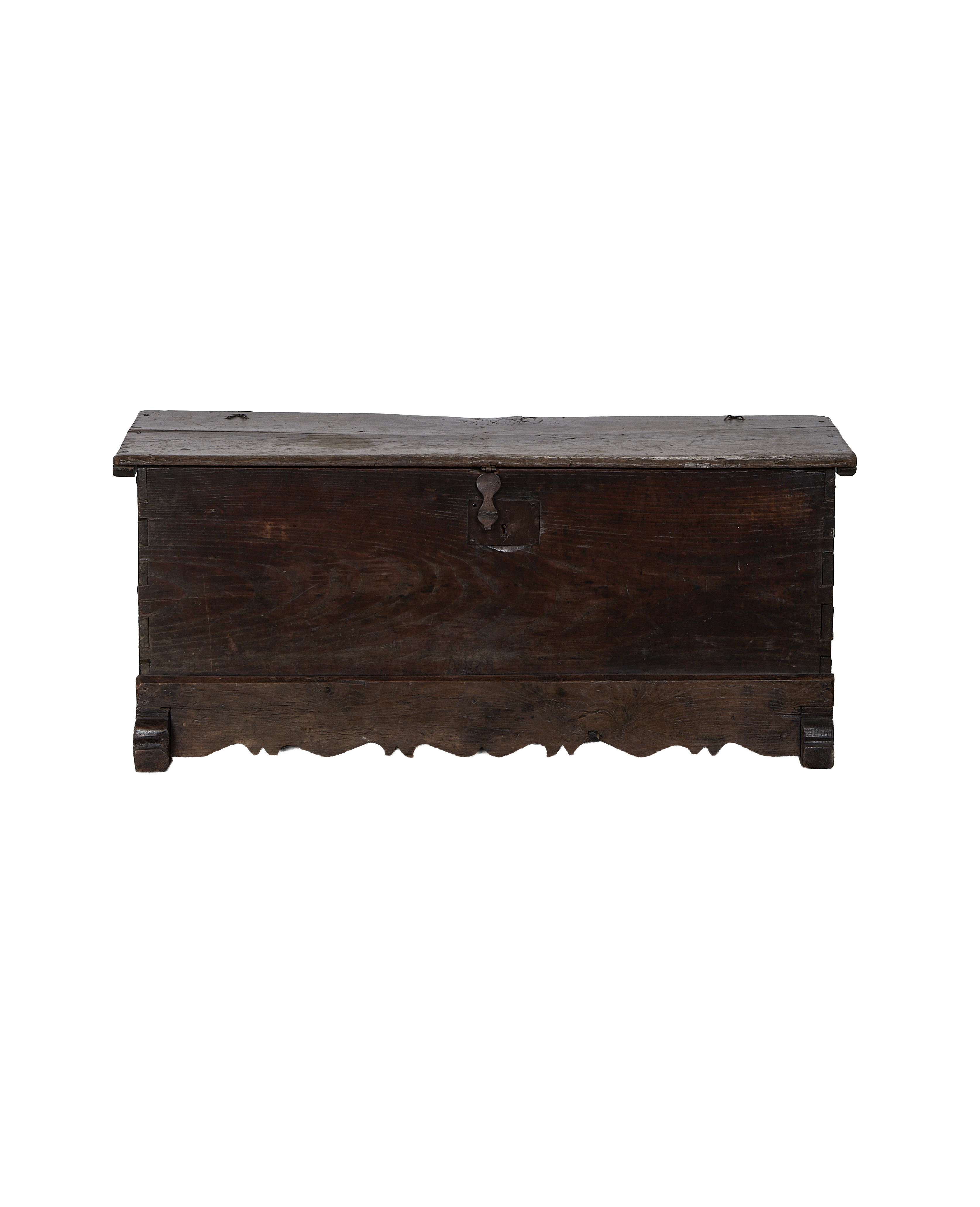 Vintage dark oak French chest with rustic metal lock and scalloped bottom.