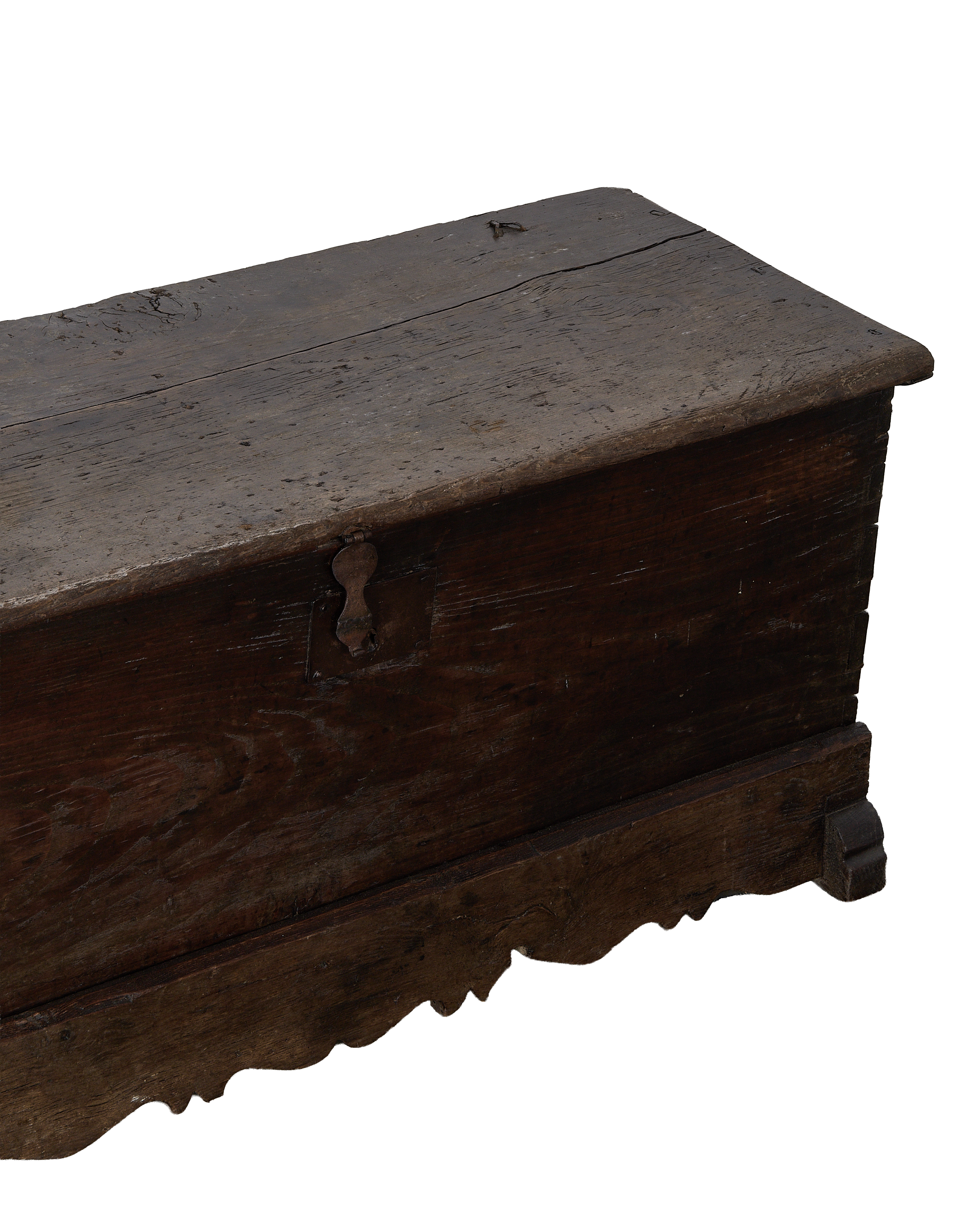 Vintage French oak wood chest with ornate escutcheon and rustic distressed surface.