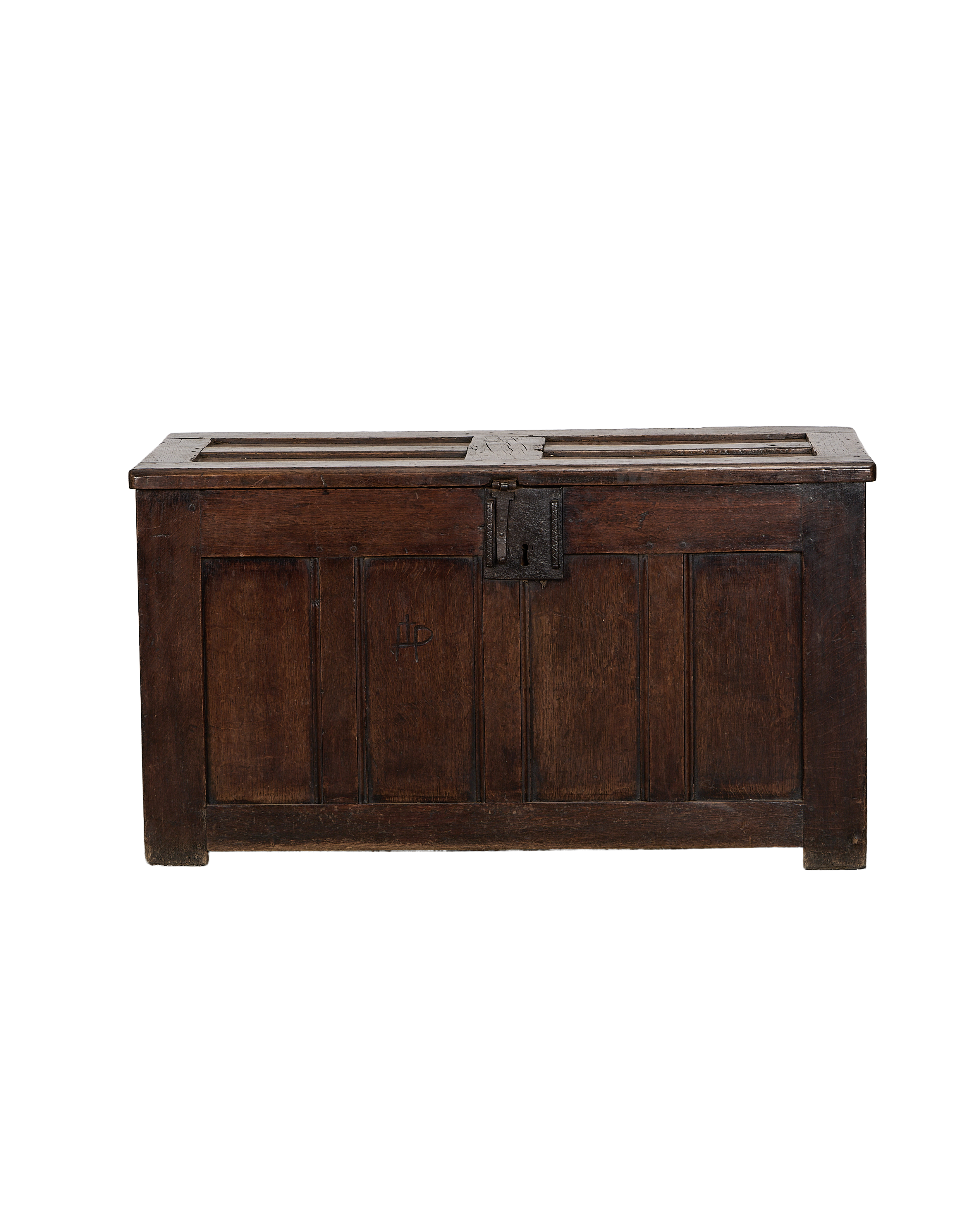 Vintage French oak wooden trunk with dark patina and rustic iron lock.