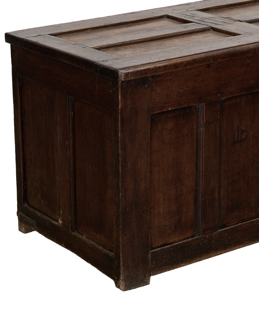 Vintage English oak wood trunk from France, showing distressed dark patina and plank details.