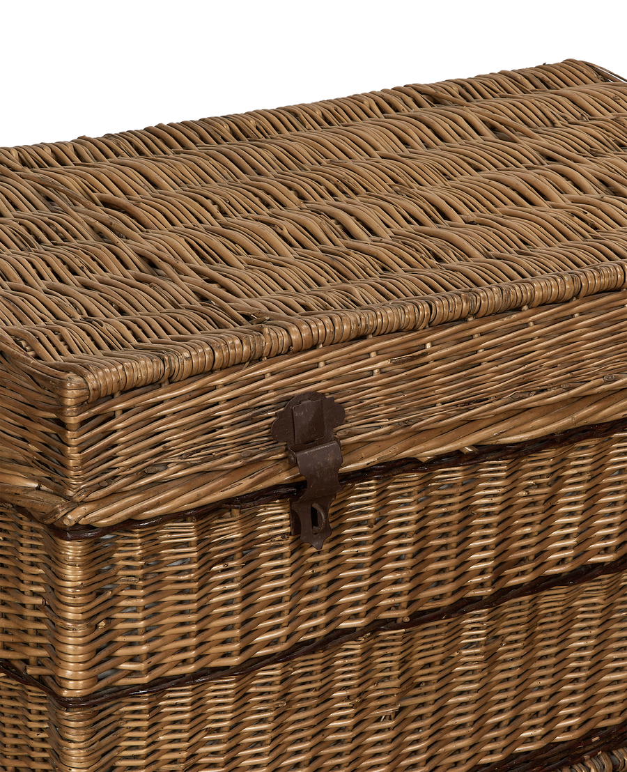 Vintage French oak wicker chest with a detailed view of its woven texture and aged metal clasp.