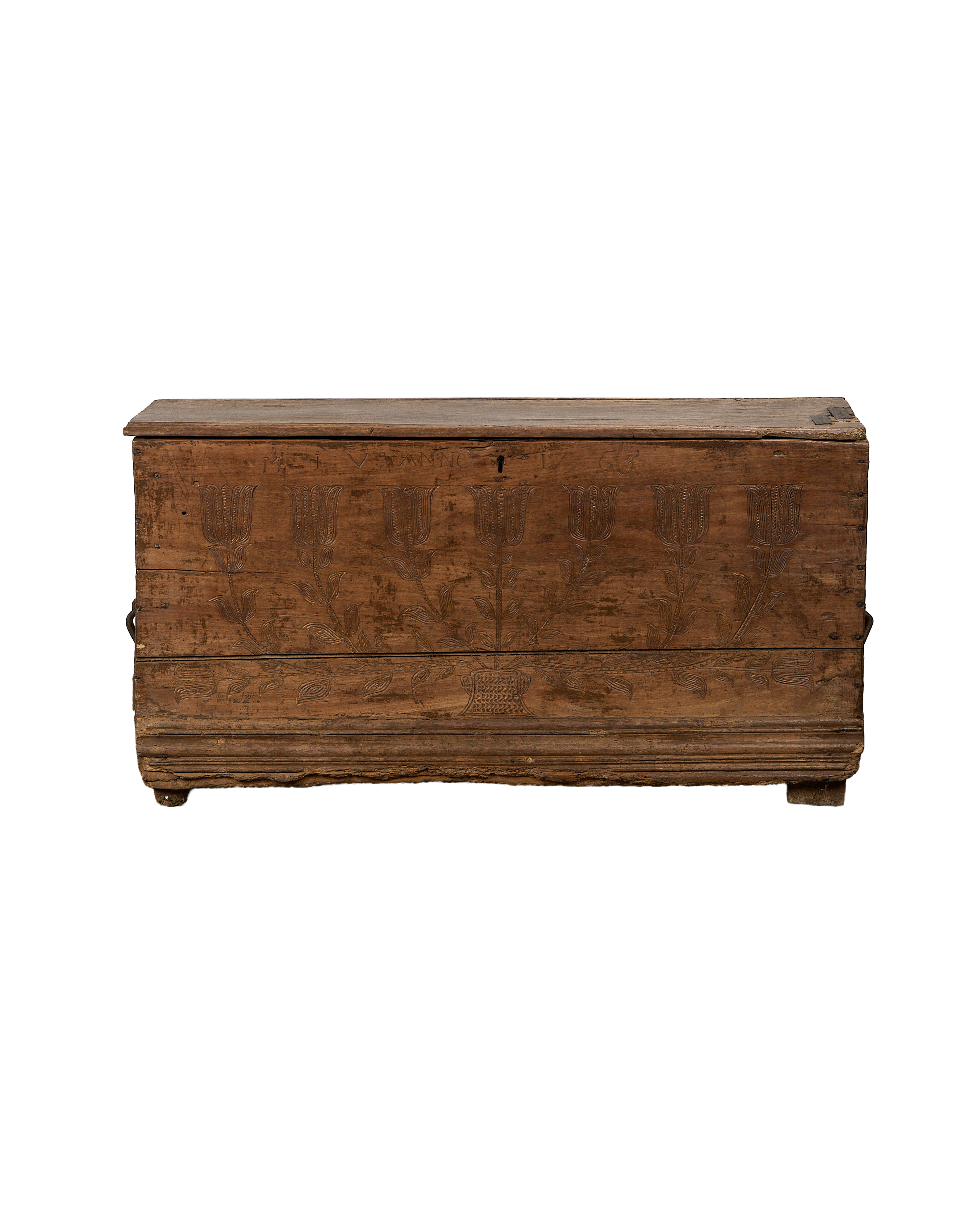 Vintage French oak chest, beautifully carved with flower and plant motifs, displaying characteristic antique wear.