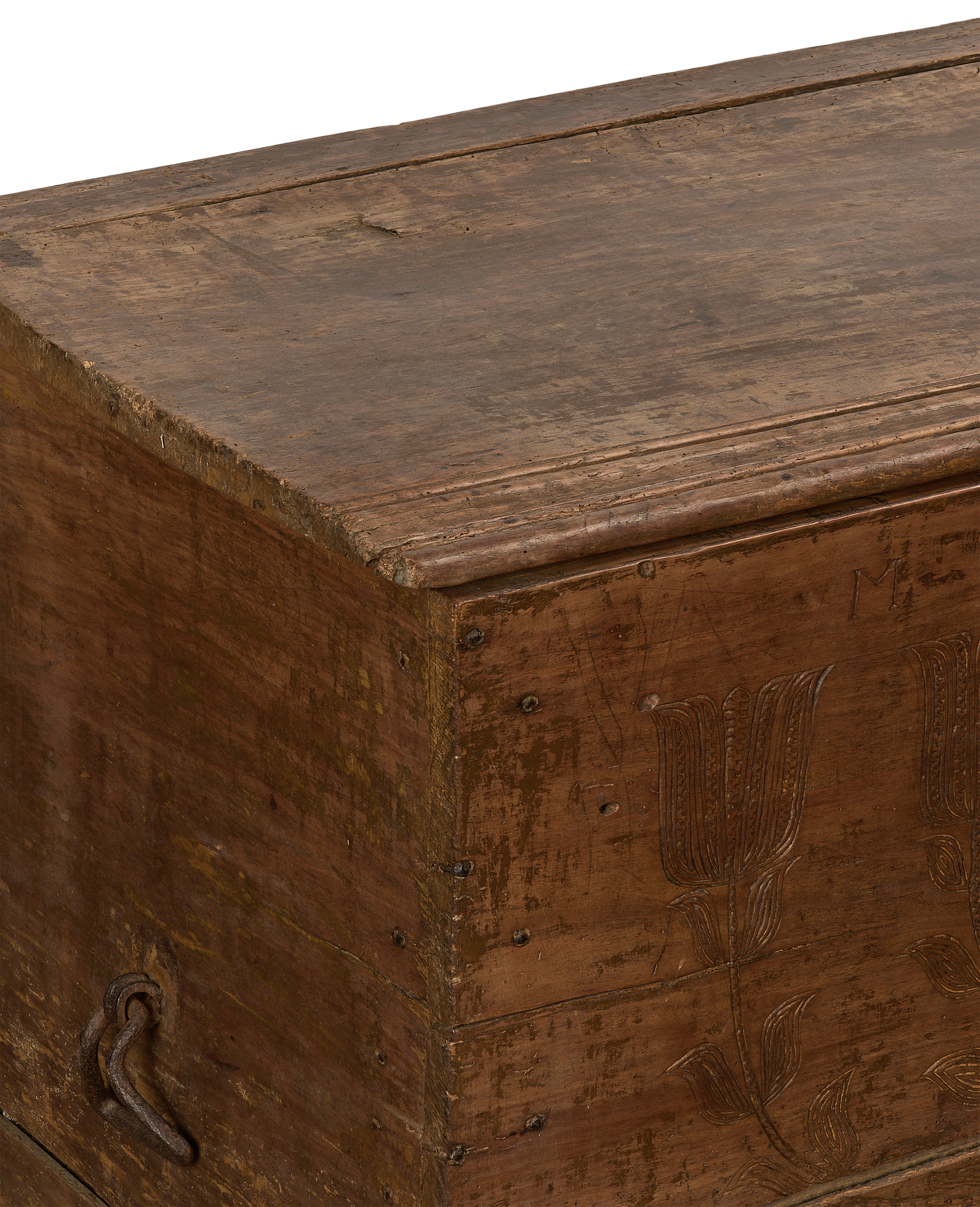 Vintage French oak chest showing original rustic wood grain and floral carving detail.