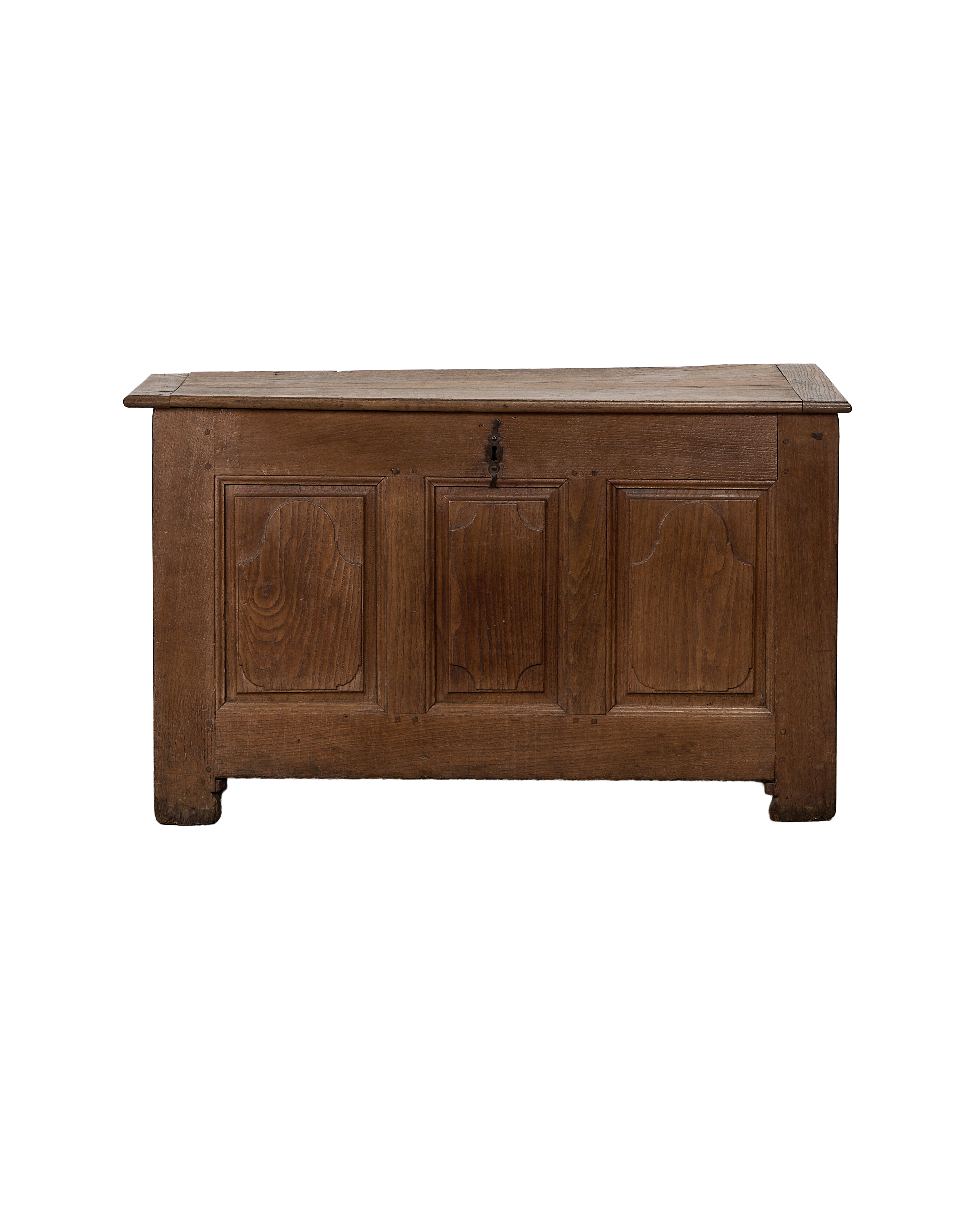 Vintage French oak blanket chest, front view, carved panels, iron keyhole, rustic condition.