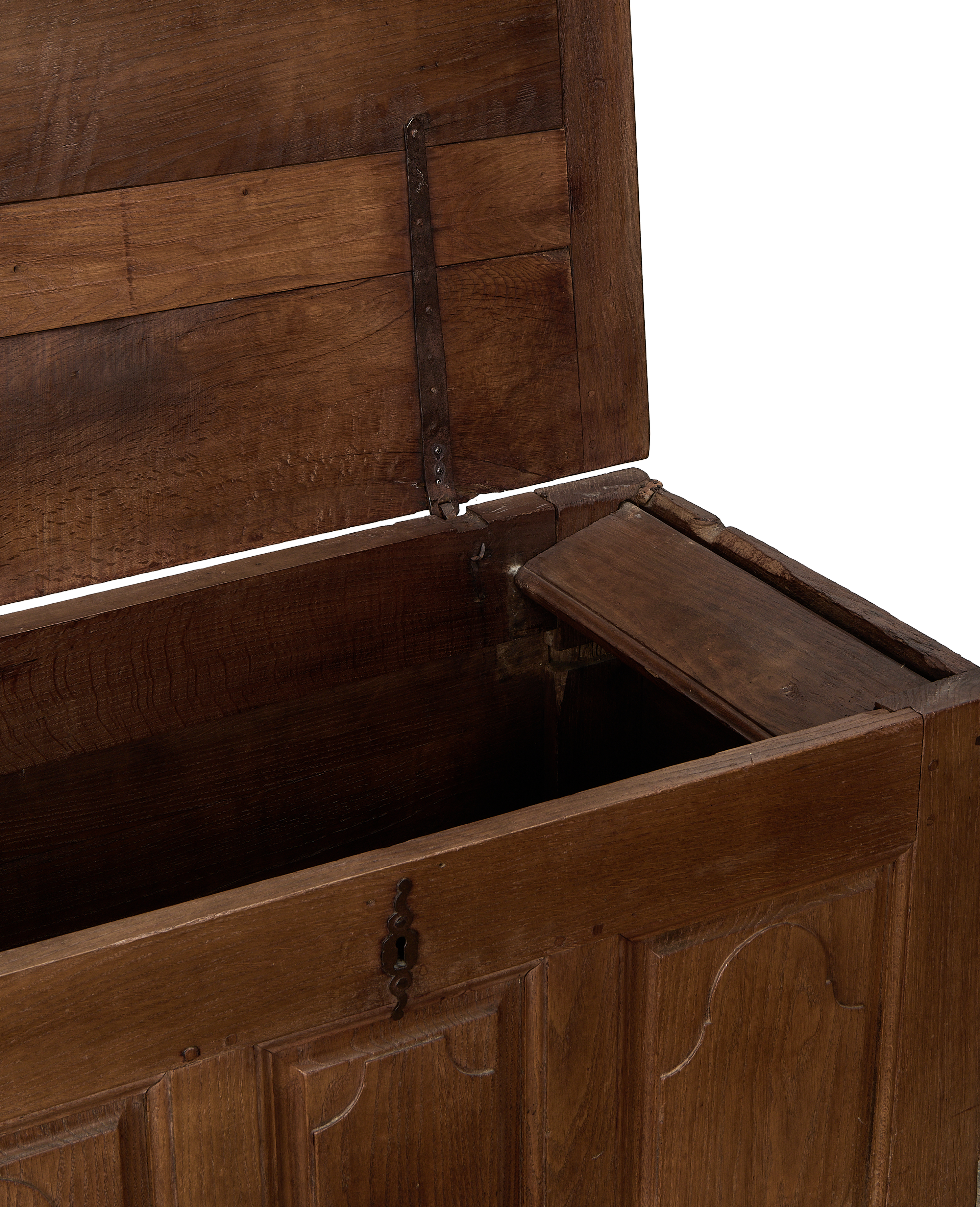 Open vintage French oak blanket chest showing hidden internal drawer and iron hinge.