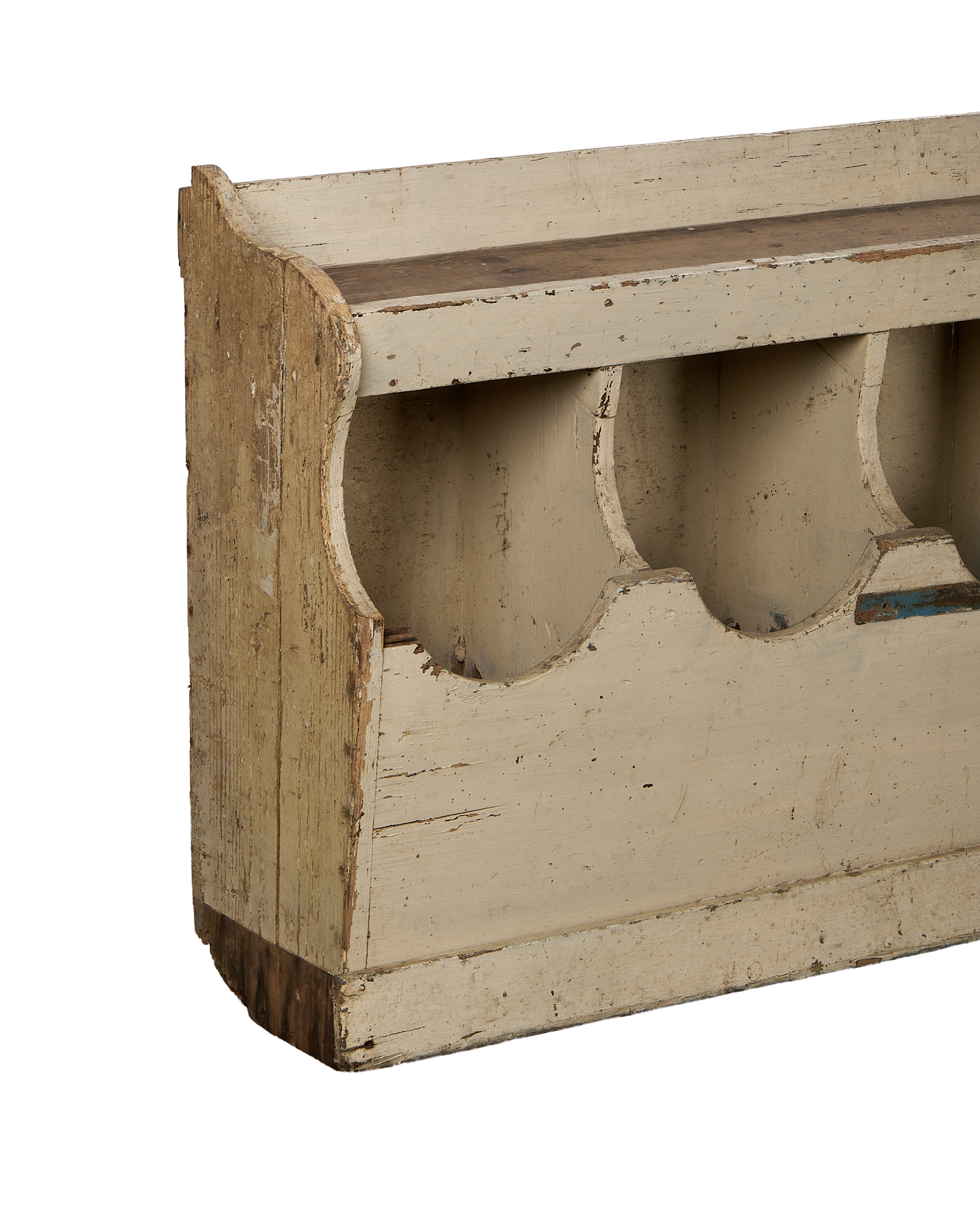 Close-up of vintage French farmhouse oak grain bins, showcasing detailed curved compartments.