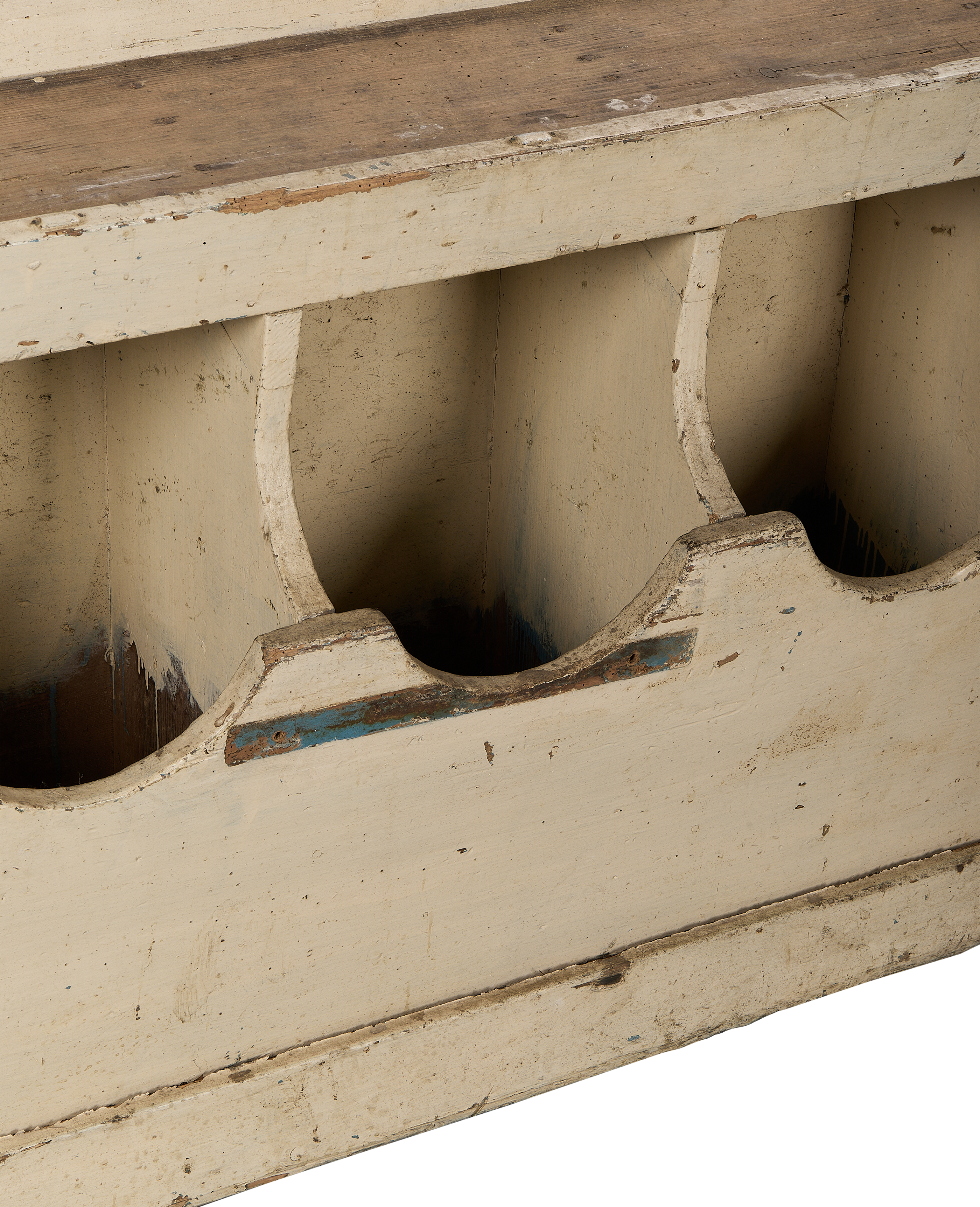 Close-up of vintage French farmhouse oak grain bins, distressed cream paint, and interior view of individual hoppers.