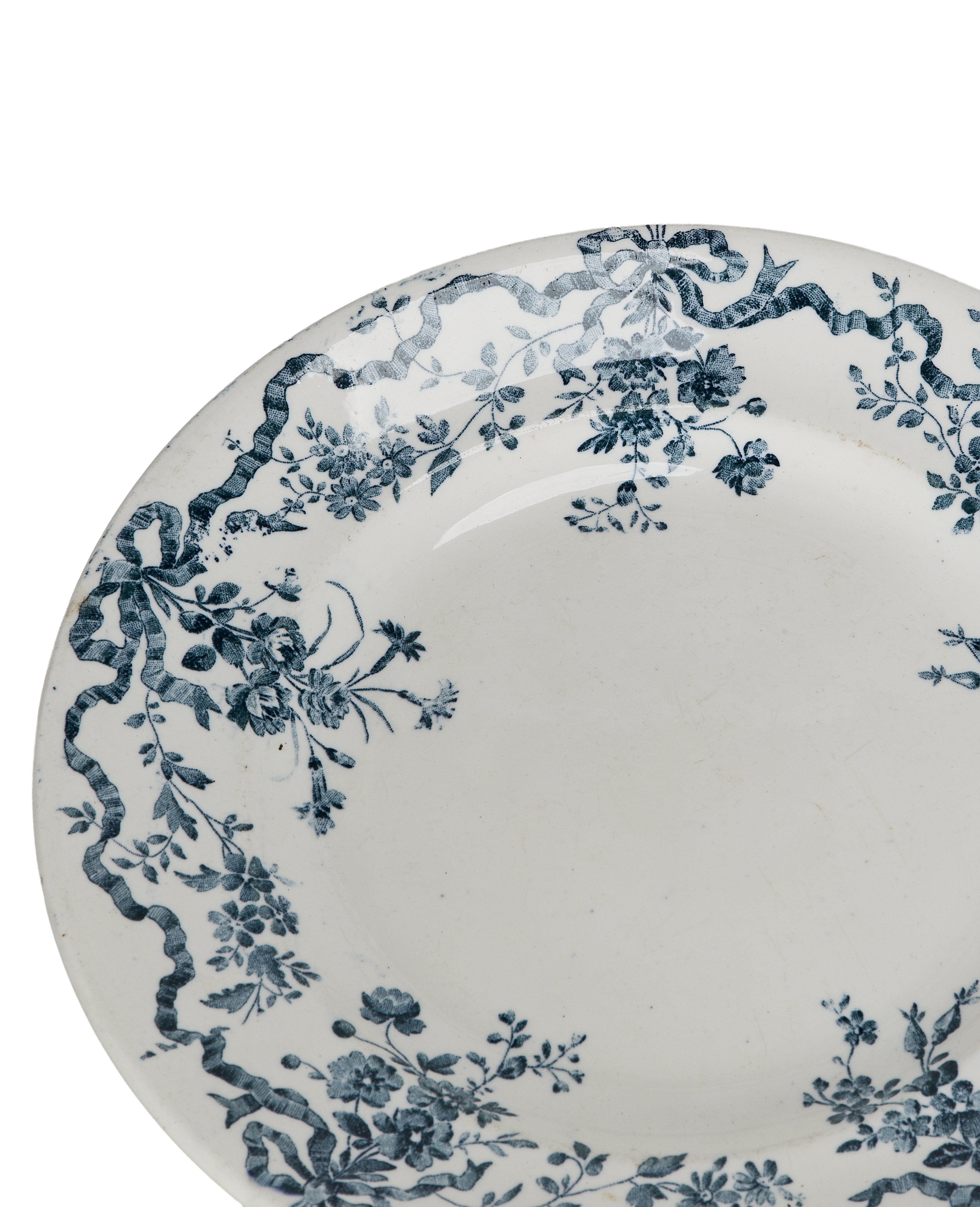 Vintage French Wreath Plate, close-up of blue floral and ribbon rim detail.