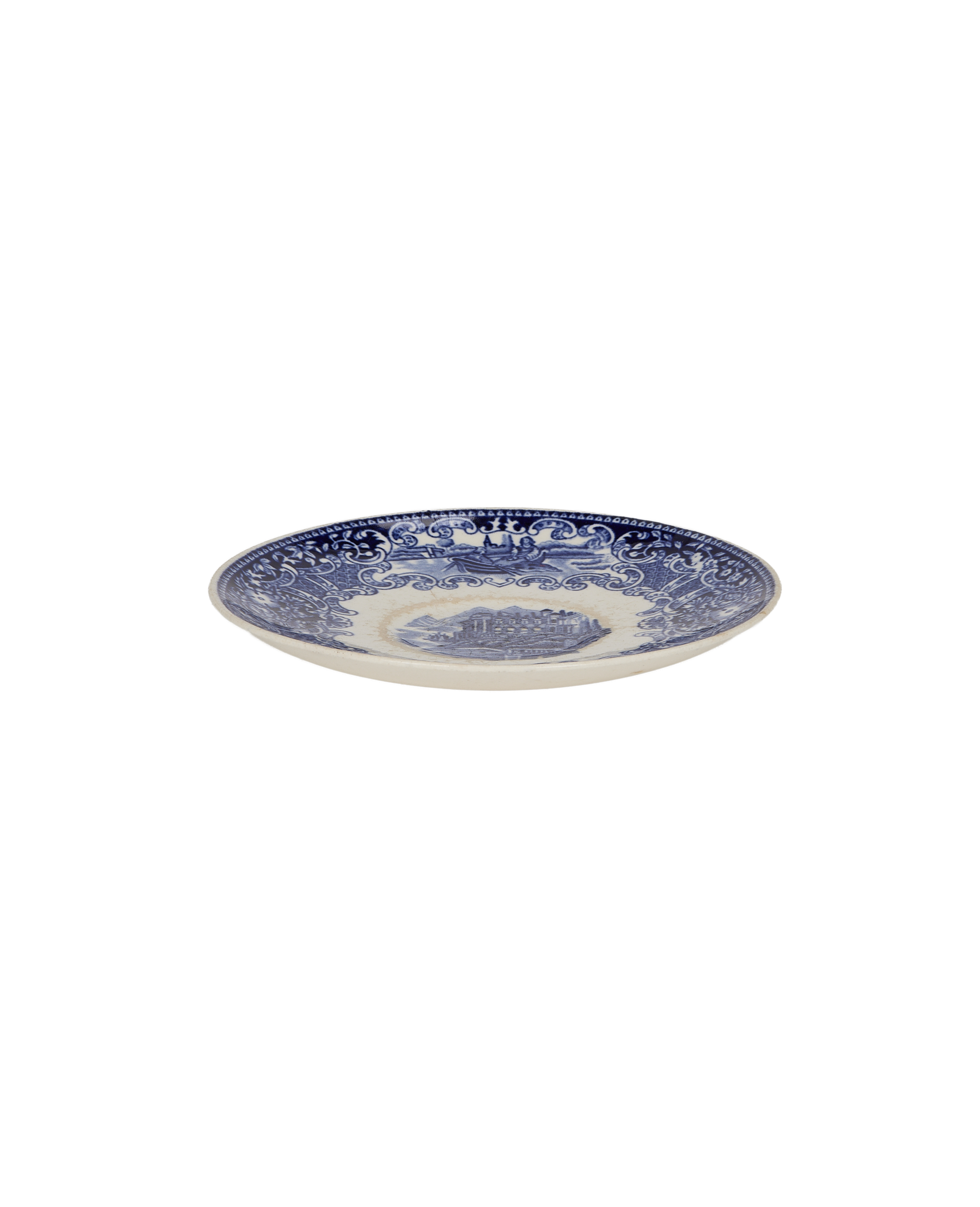 Vintage French porcelain plate, blue and white scenic pattern with scrollwork border, from France.