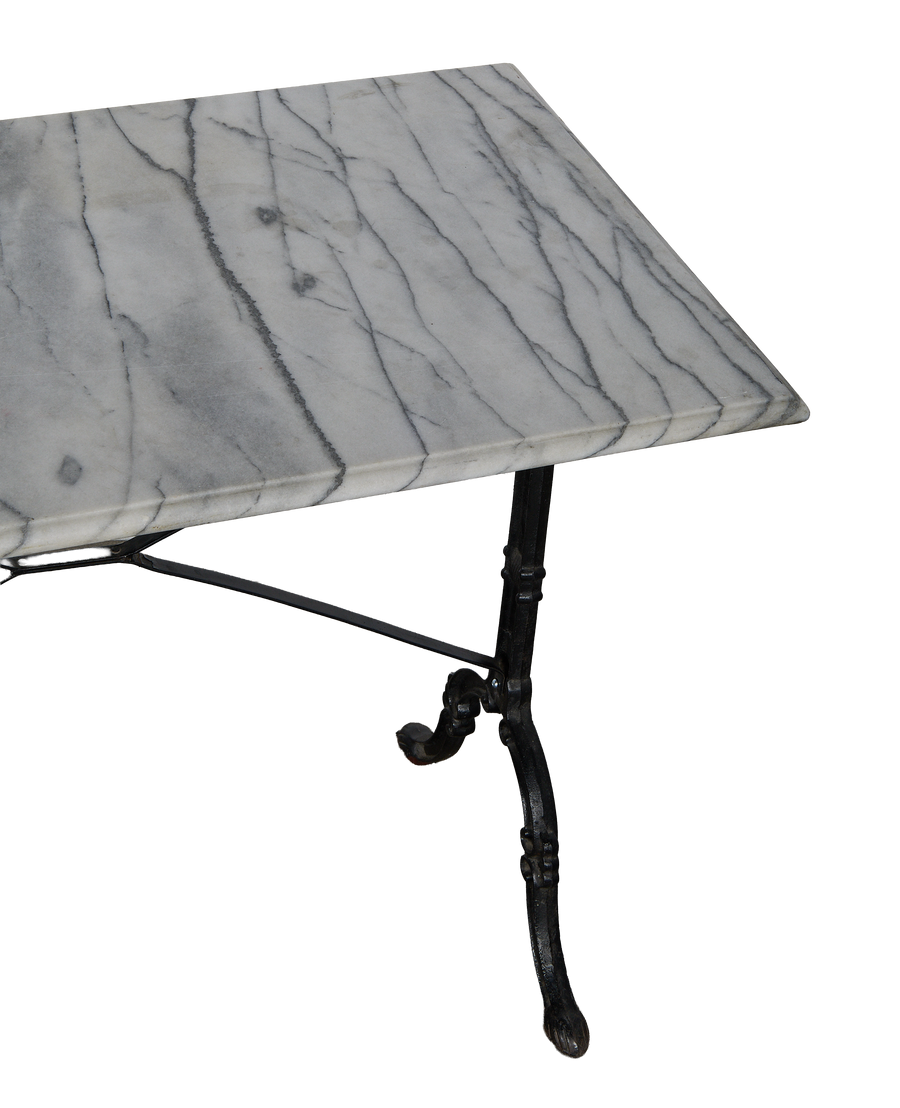 Vintage French marble bistro table, showing detailed black veining on light gray top.