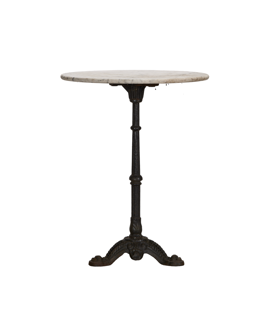 Vintage French round marble bistro table, showing detailed dark cast iron base.