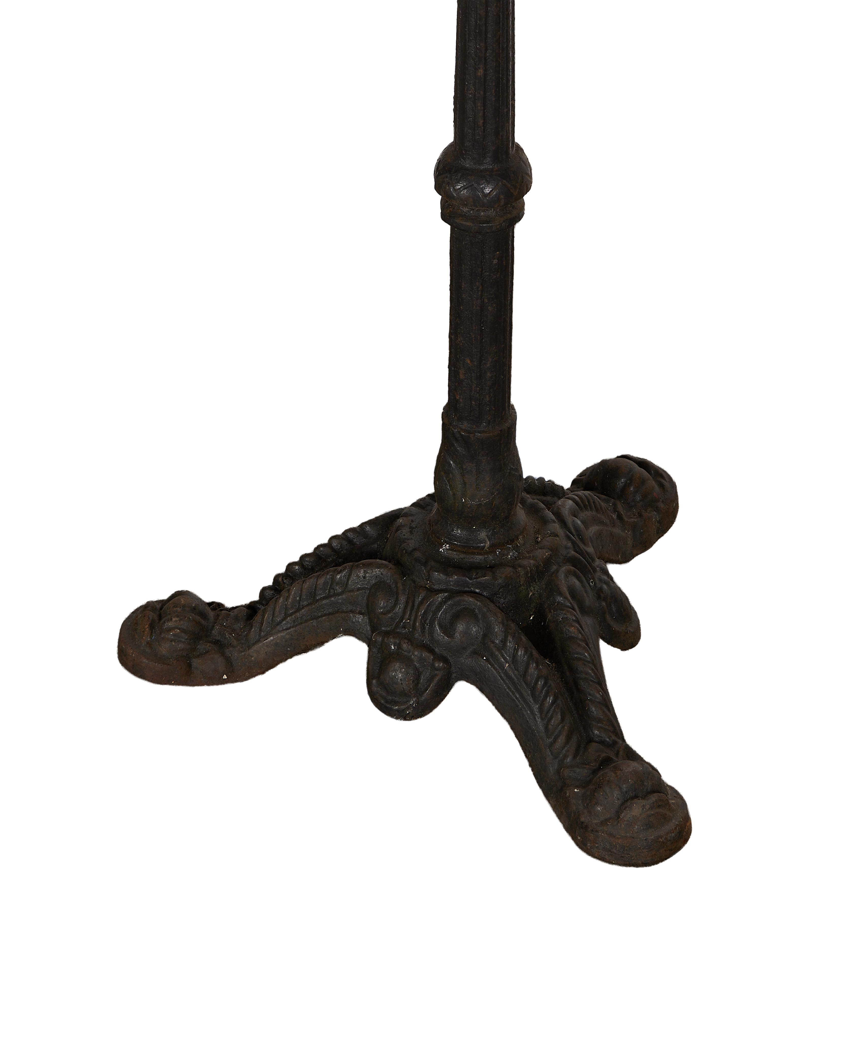 Vintage French cast iron bistro table base with ornate scrolled tripod feet.