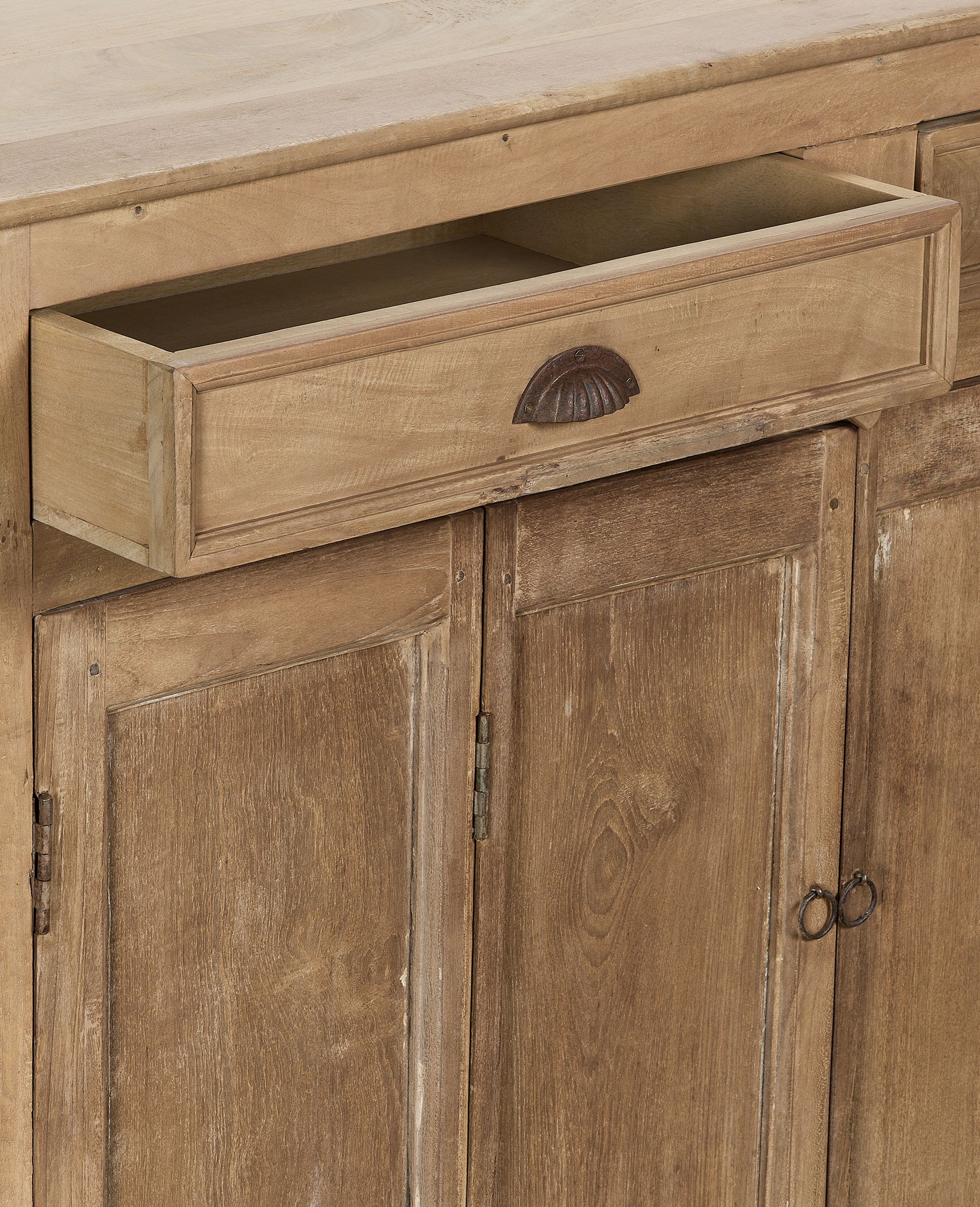Vintage bleached oak wood cabinet with open drawer, detailed rustic pull hardware.