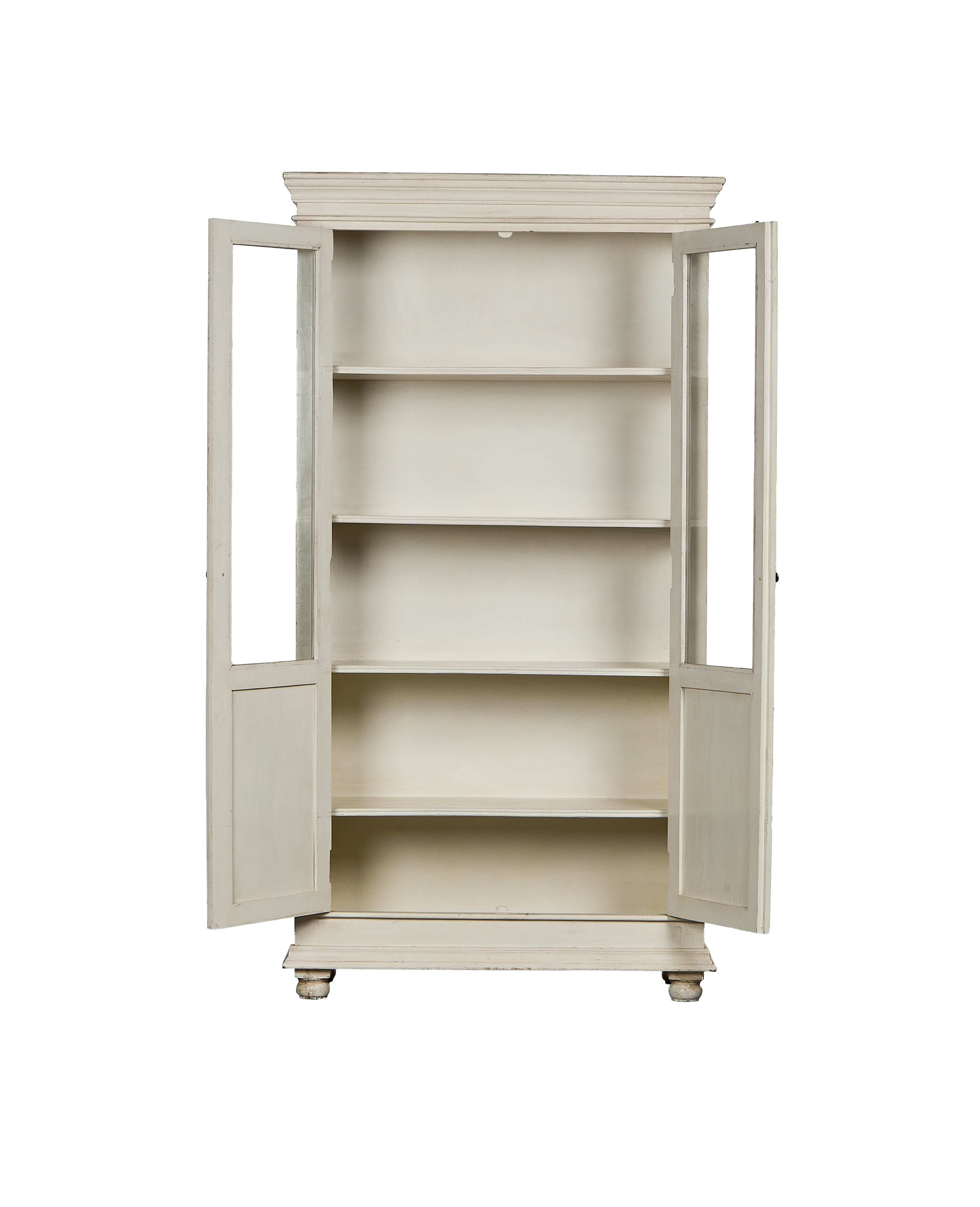 Opened vintage Indian oak wood cabinet, distressed off-white paint, revealing five interior shelves.