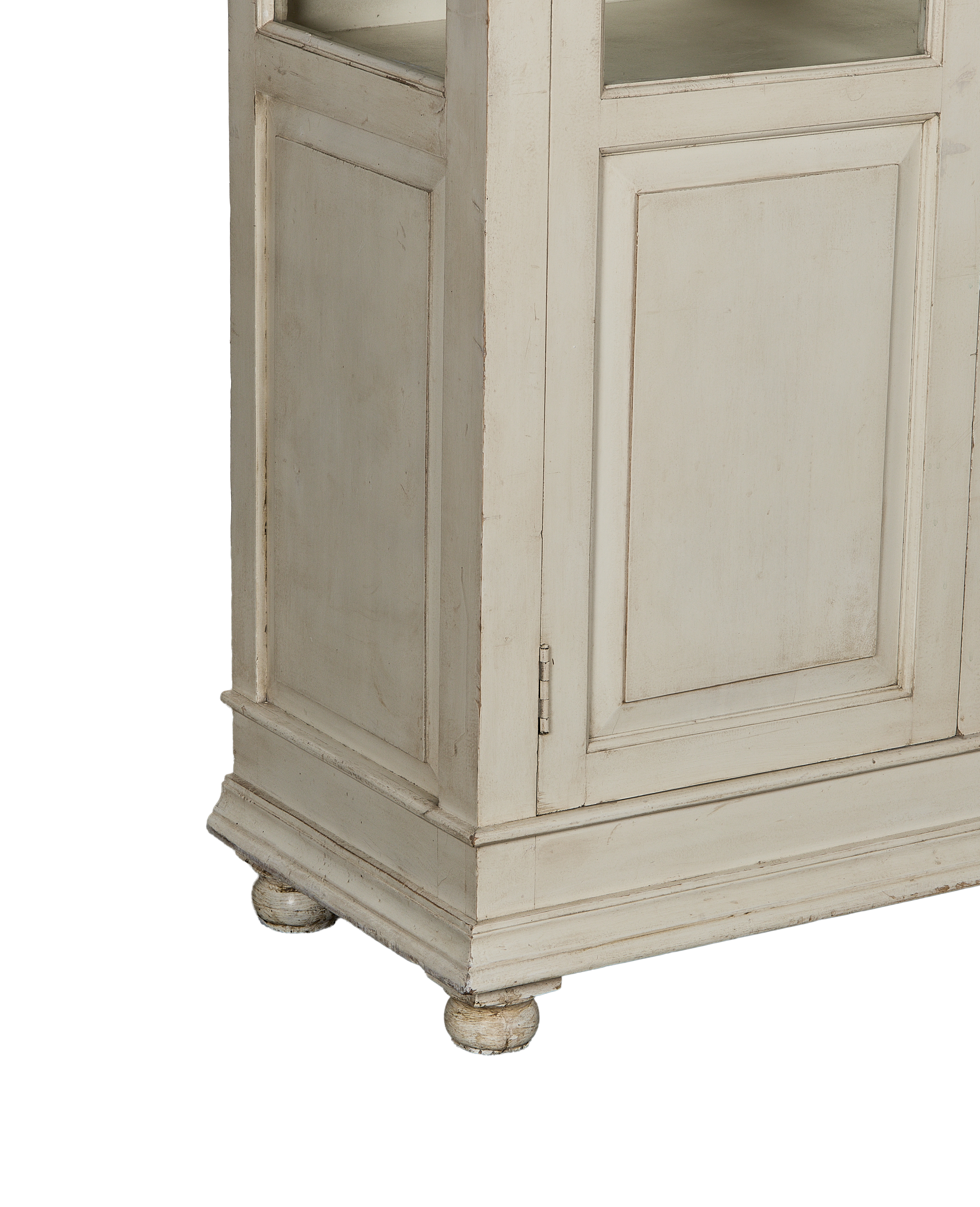 Vintage oak wood cabinet with distressed painted finish, detailed base molding, and round bun feet.