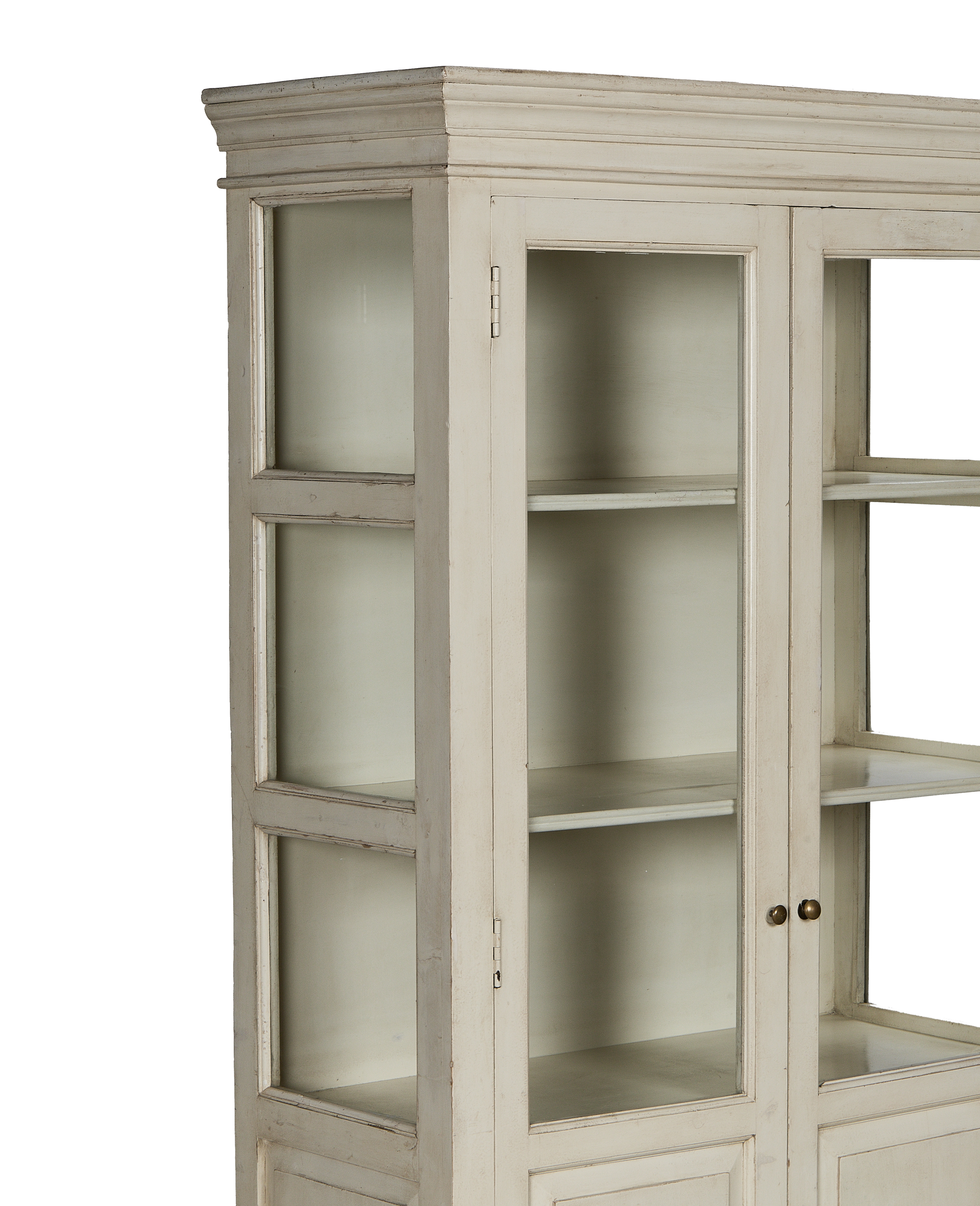 Vintage Indian painted oak cabinet, detailed view of distressed white finish, glass door, brass knobs.