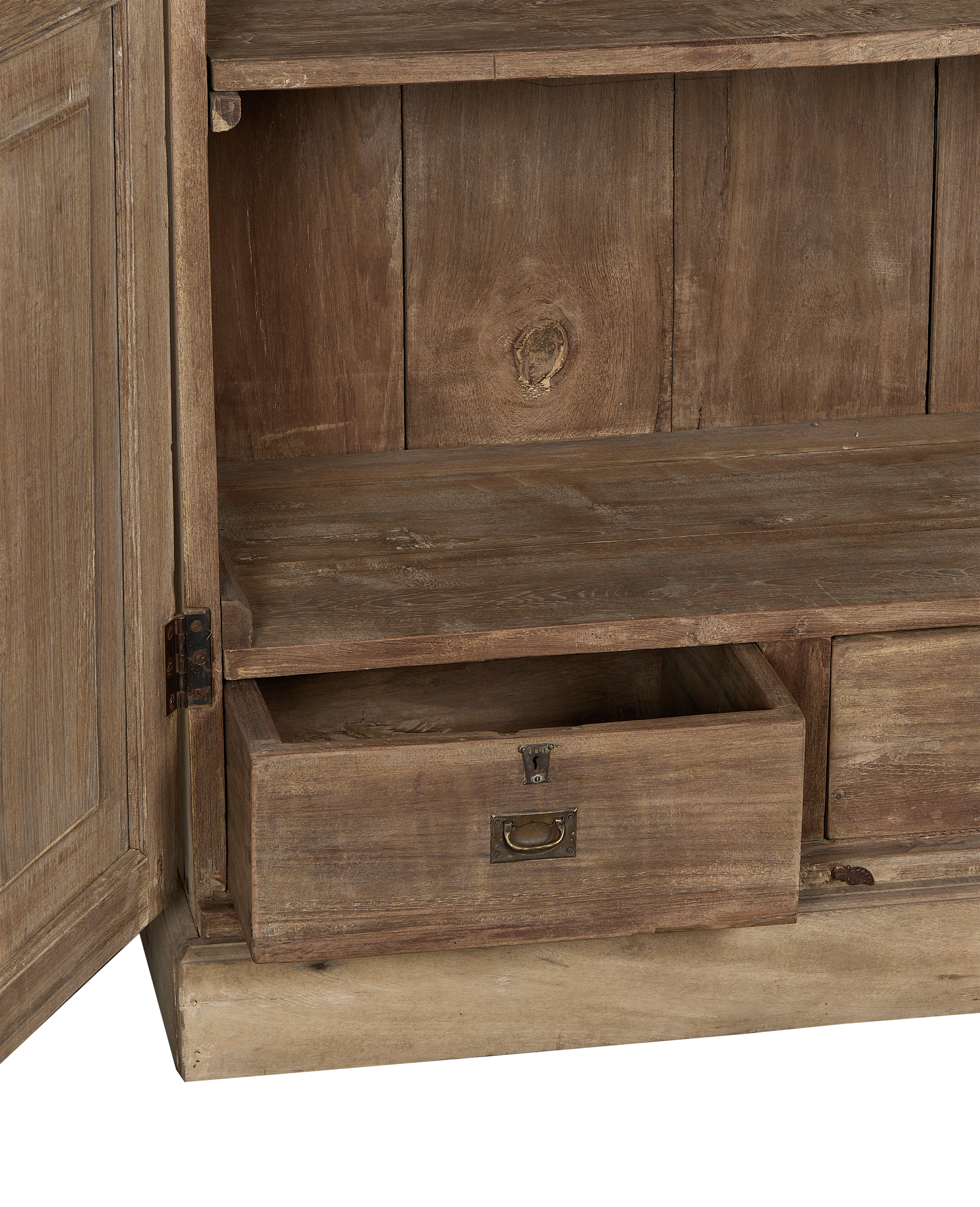 Vintage bleached oak Indian cabinet with open drawer, detailed brass pull and rusty hinge.