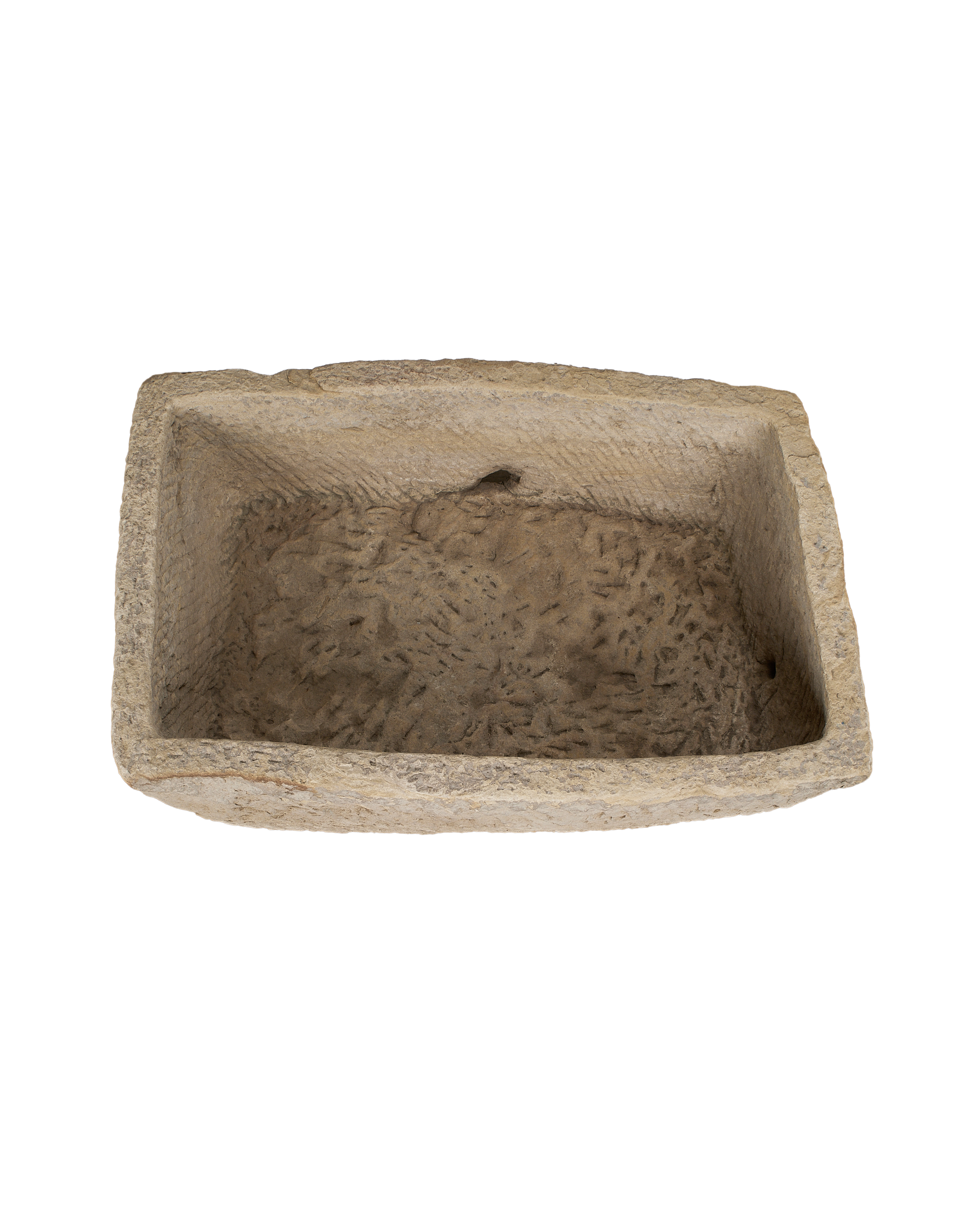 Vintage Indian OAK stone trough: overhead view showing rough textured interior and drainage hole.